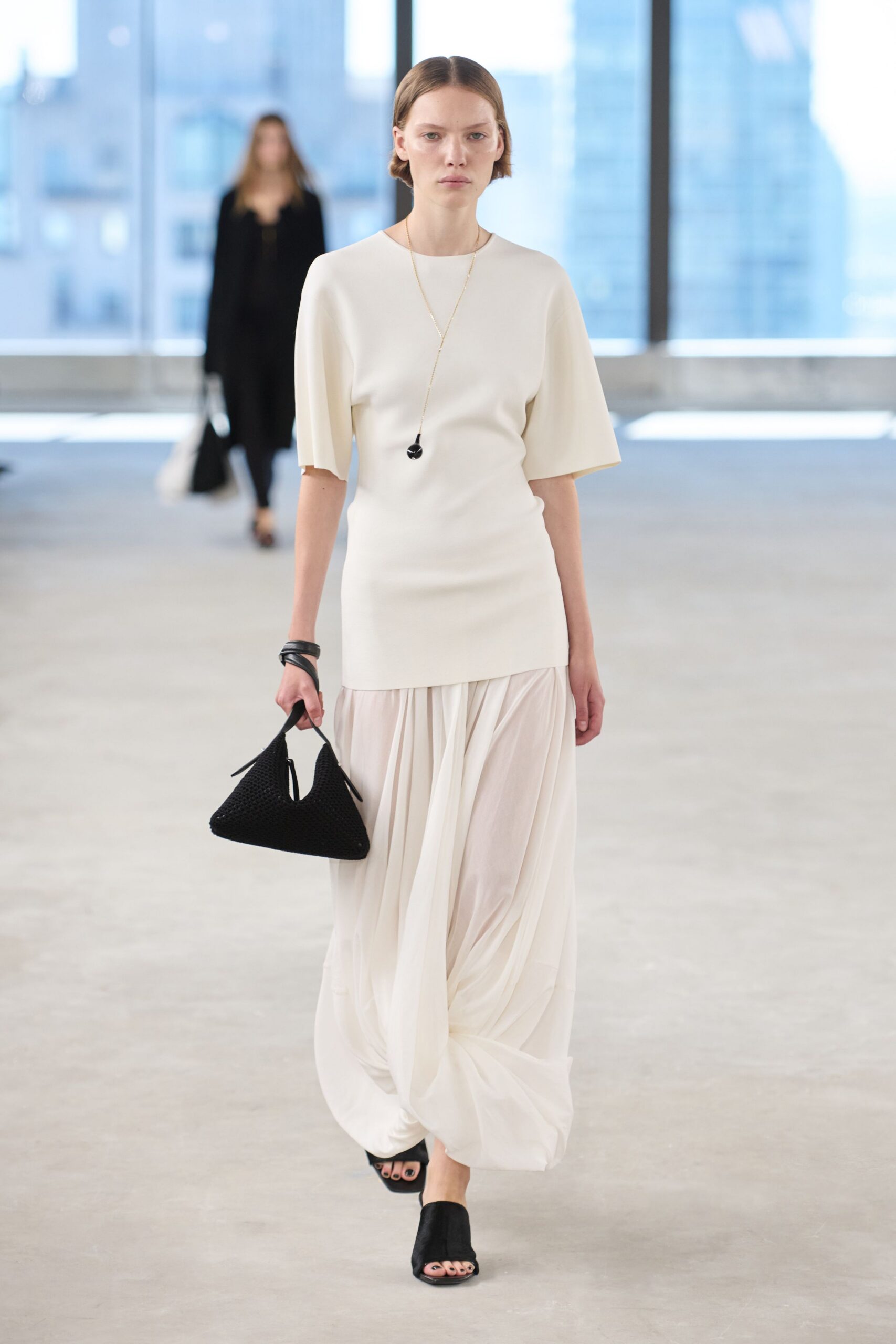 white top with pleated maxi skirt