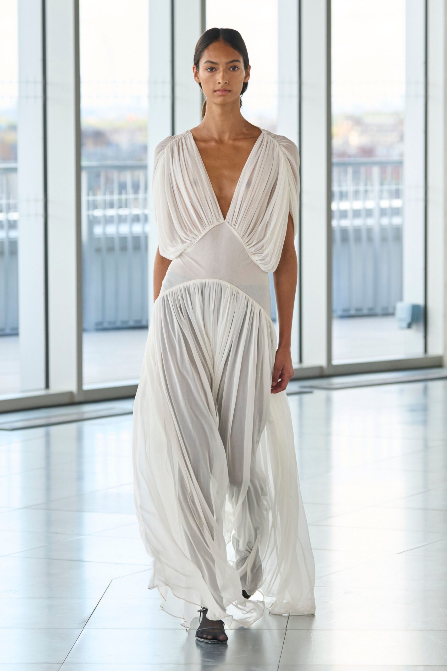 white chiffon sleeveless v-neck fitted pleated draped gown
