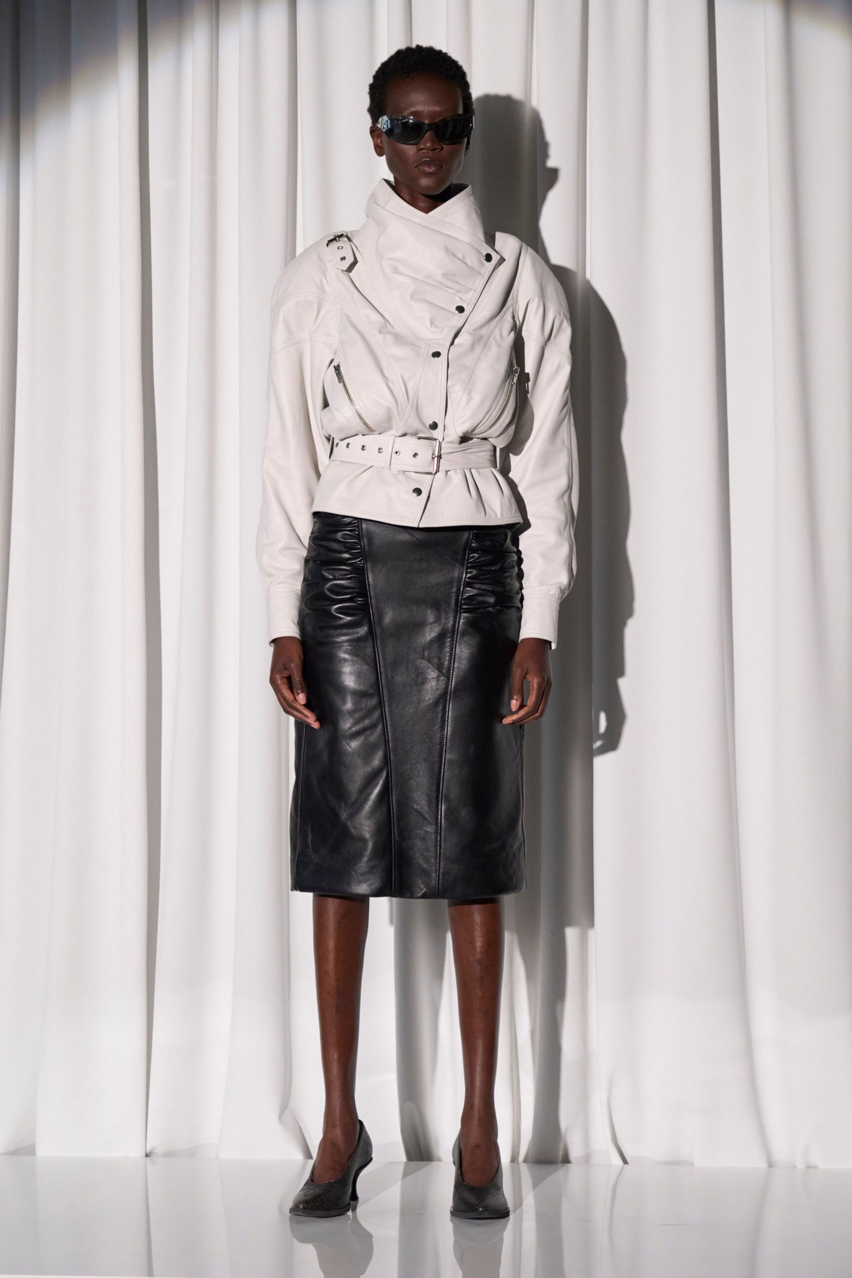 white leather long-sleeve collared fitted zippered jacket