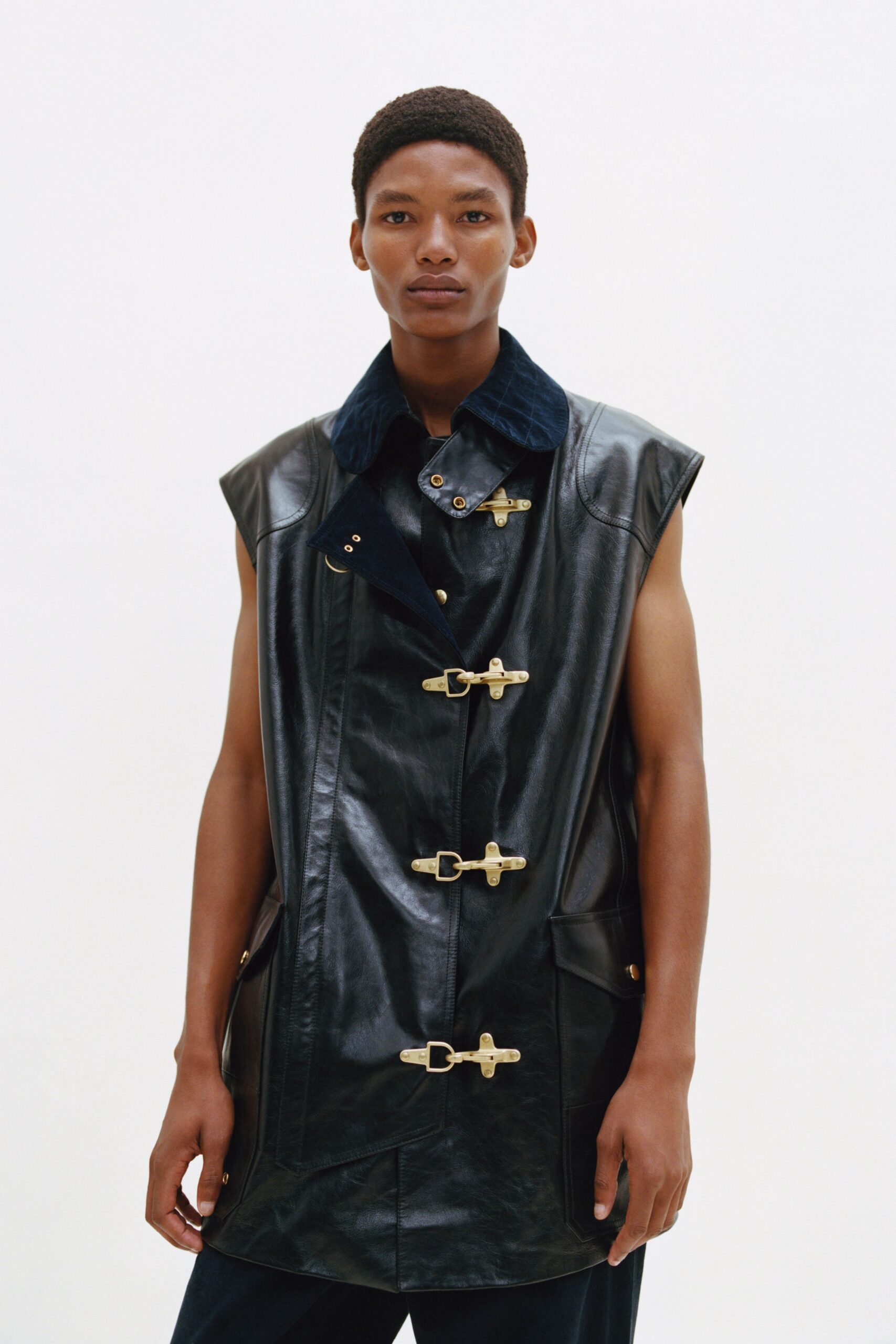 black leather sleeveless coat