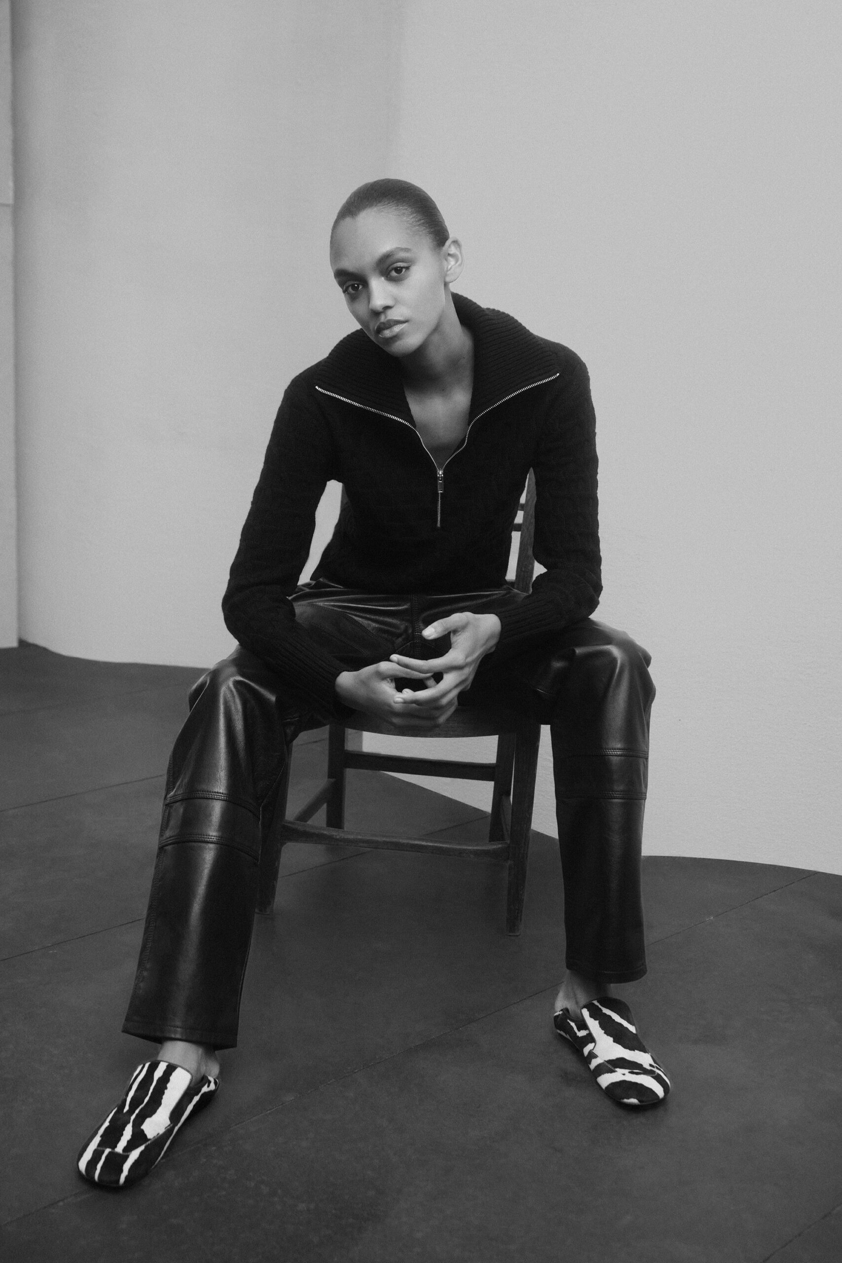 black cotton long-sleeve collared fitted textured sweater