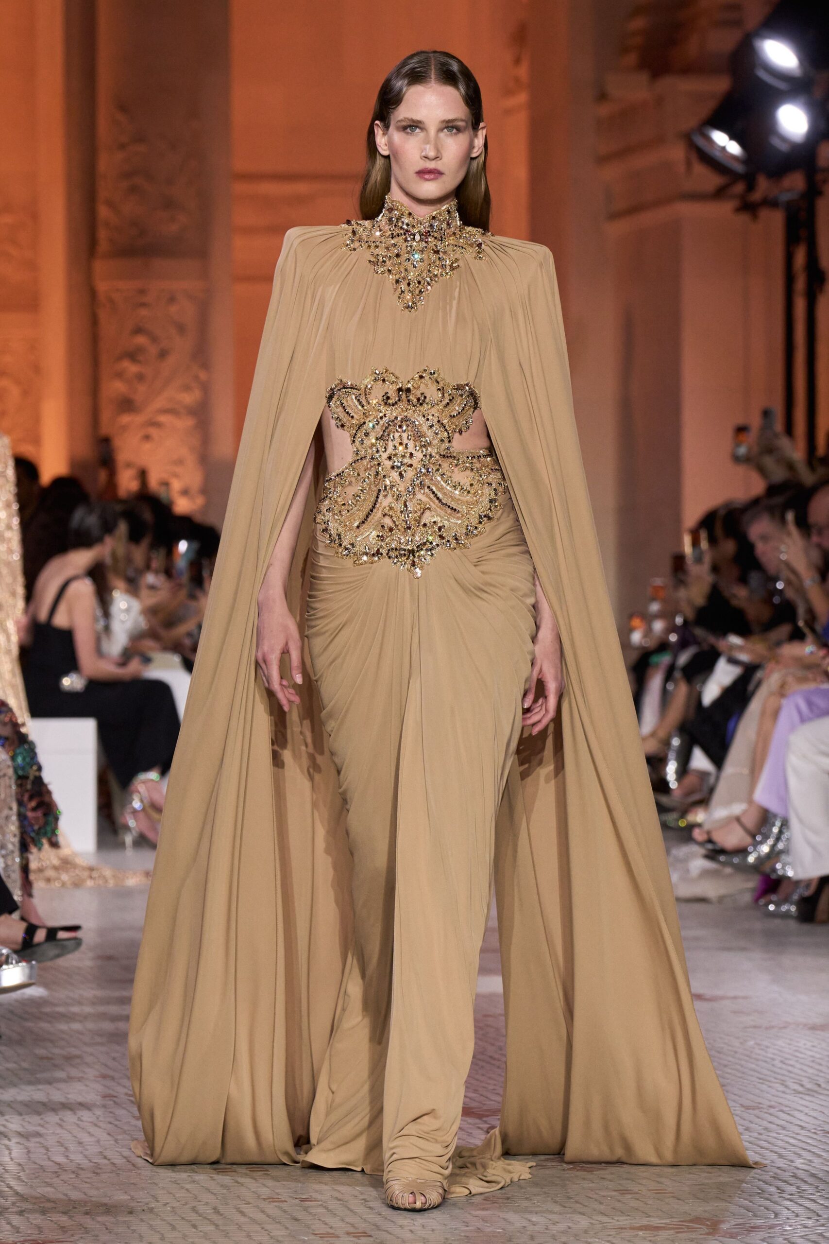 beige silk sleeveless high-neck fitted draped embellished gown