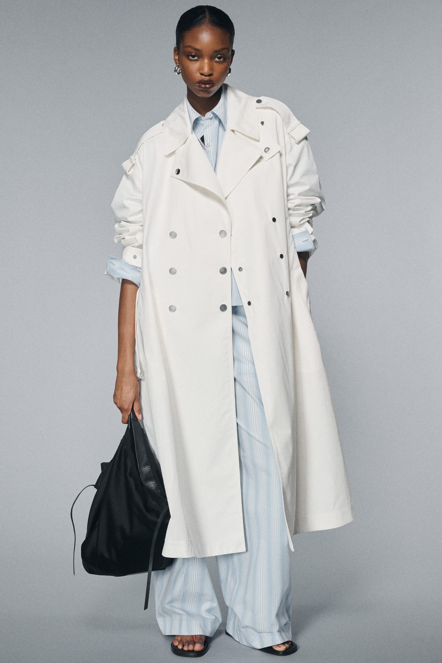 white cotton long-sleeve collared relaxed buttoned maxi trench
