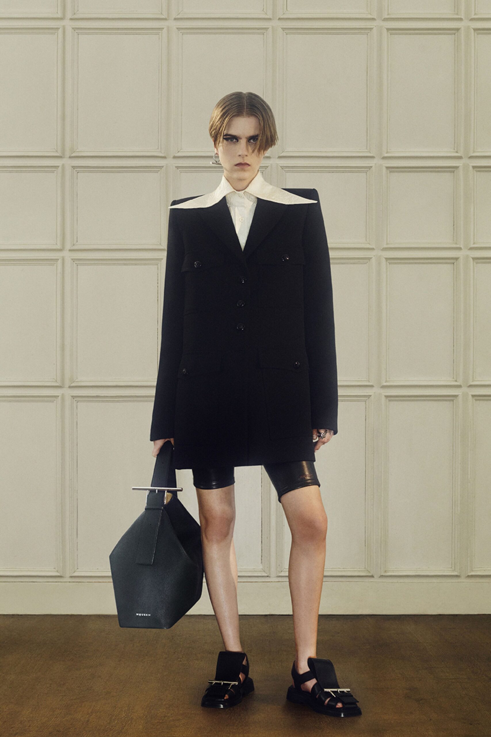 black blazer white shirt leather shorts