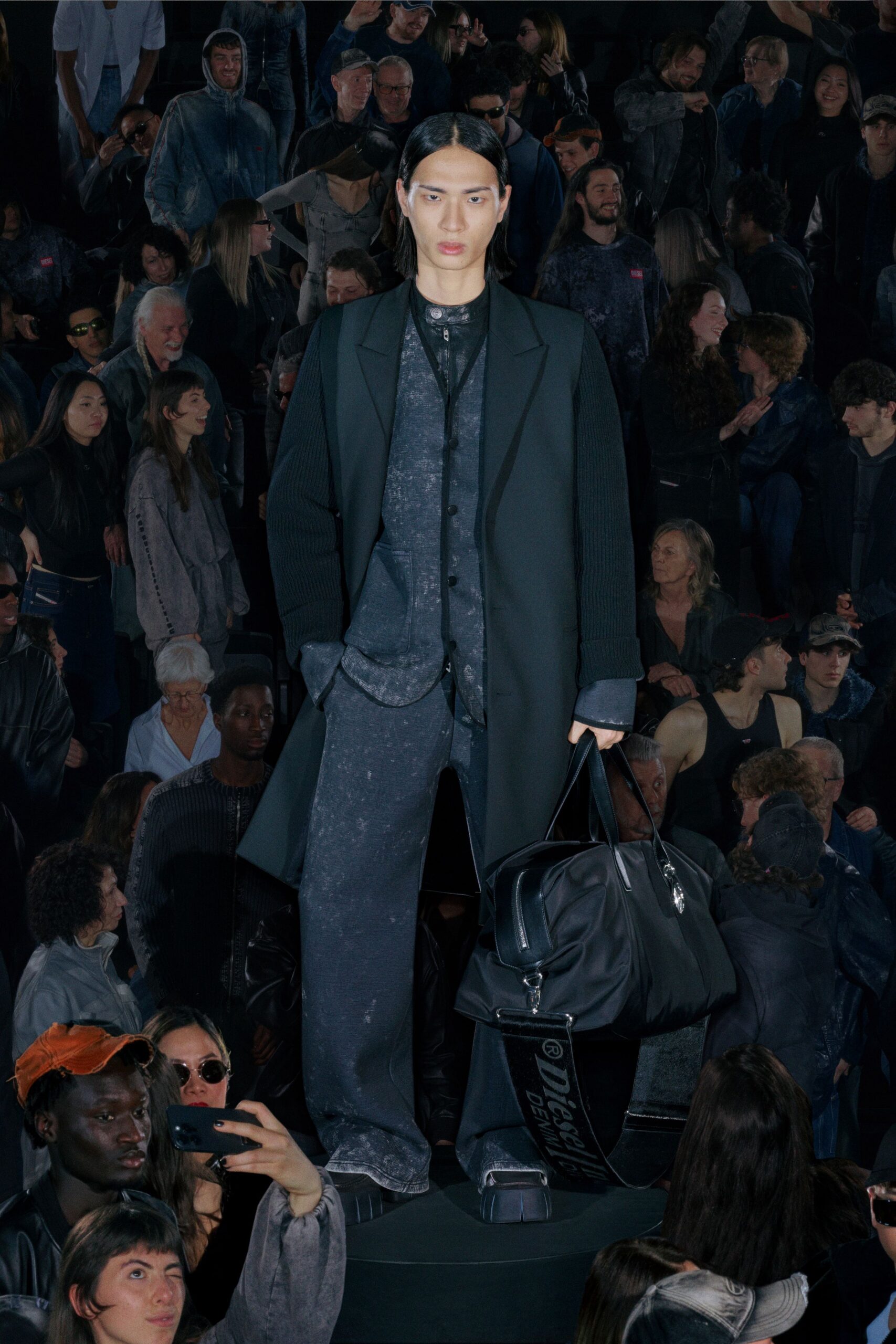 black tailored coat with relaxed pants