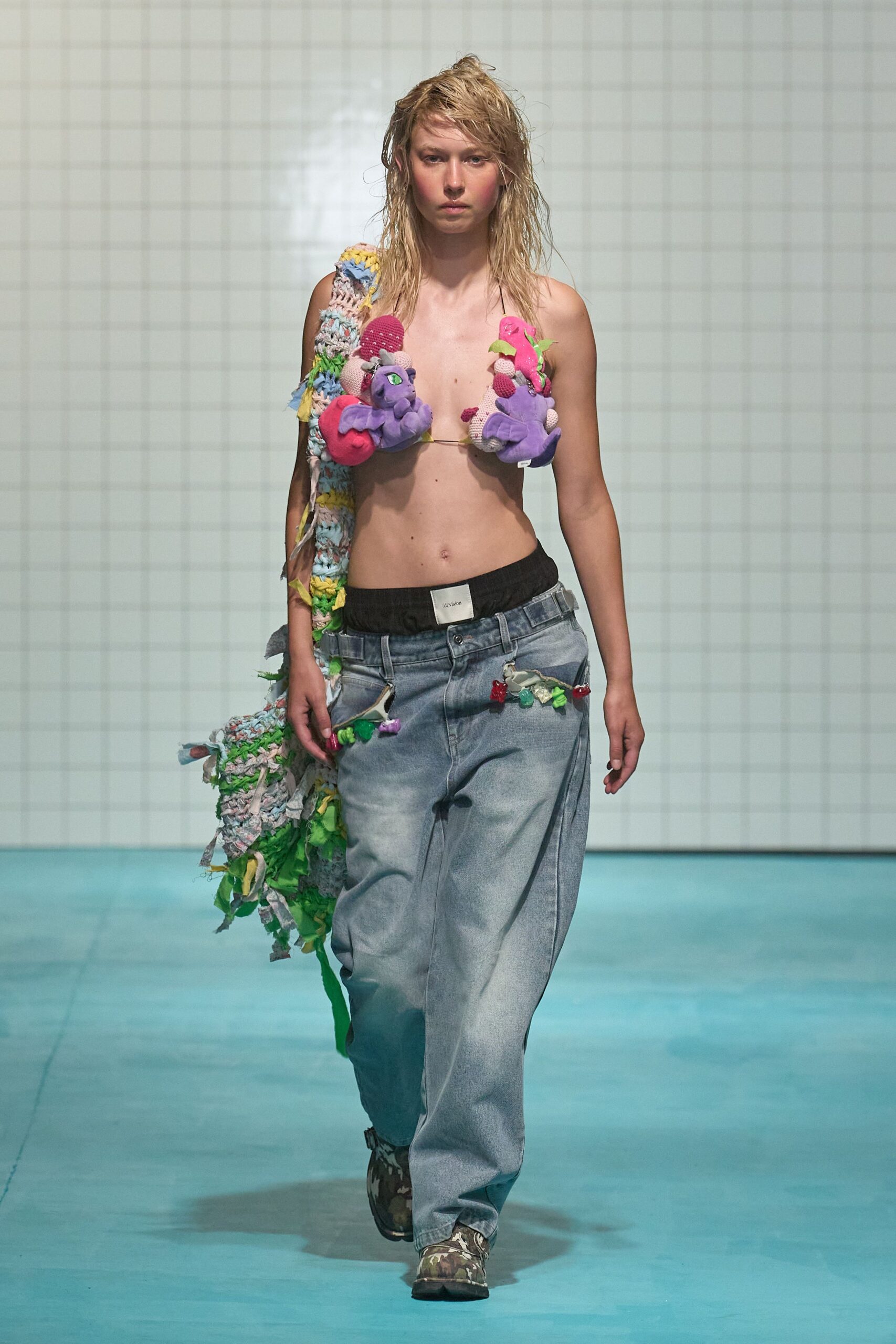 multi-colored crochet top with distressed denim