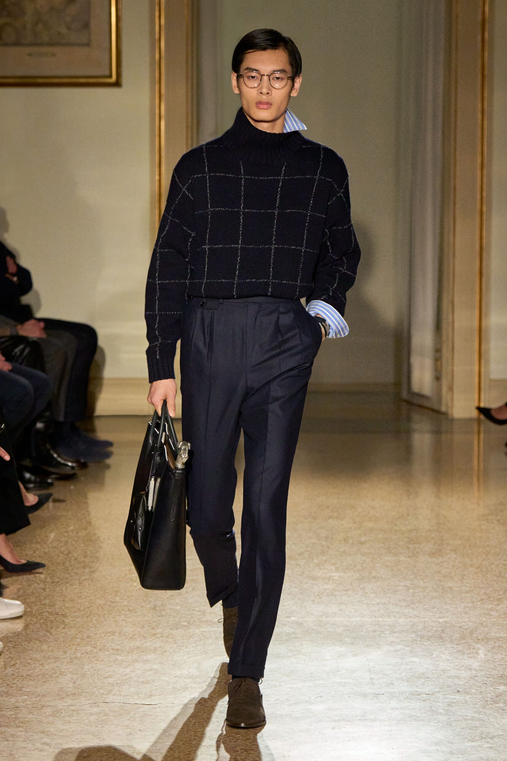 black wool sweater with navy pants