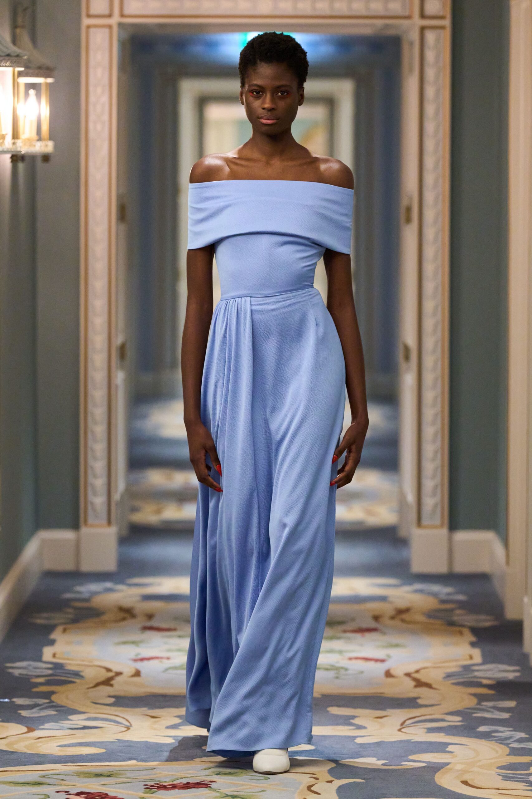 blue silk sleeveless off-shoulder fitted draped flowing jumpsuit