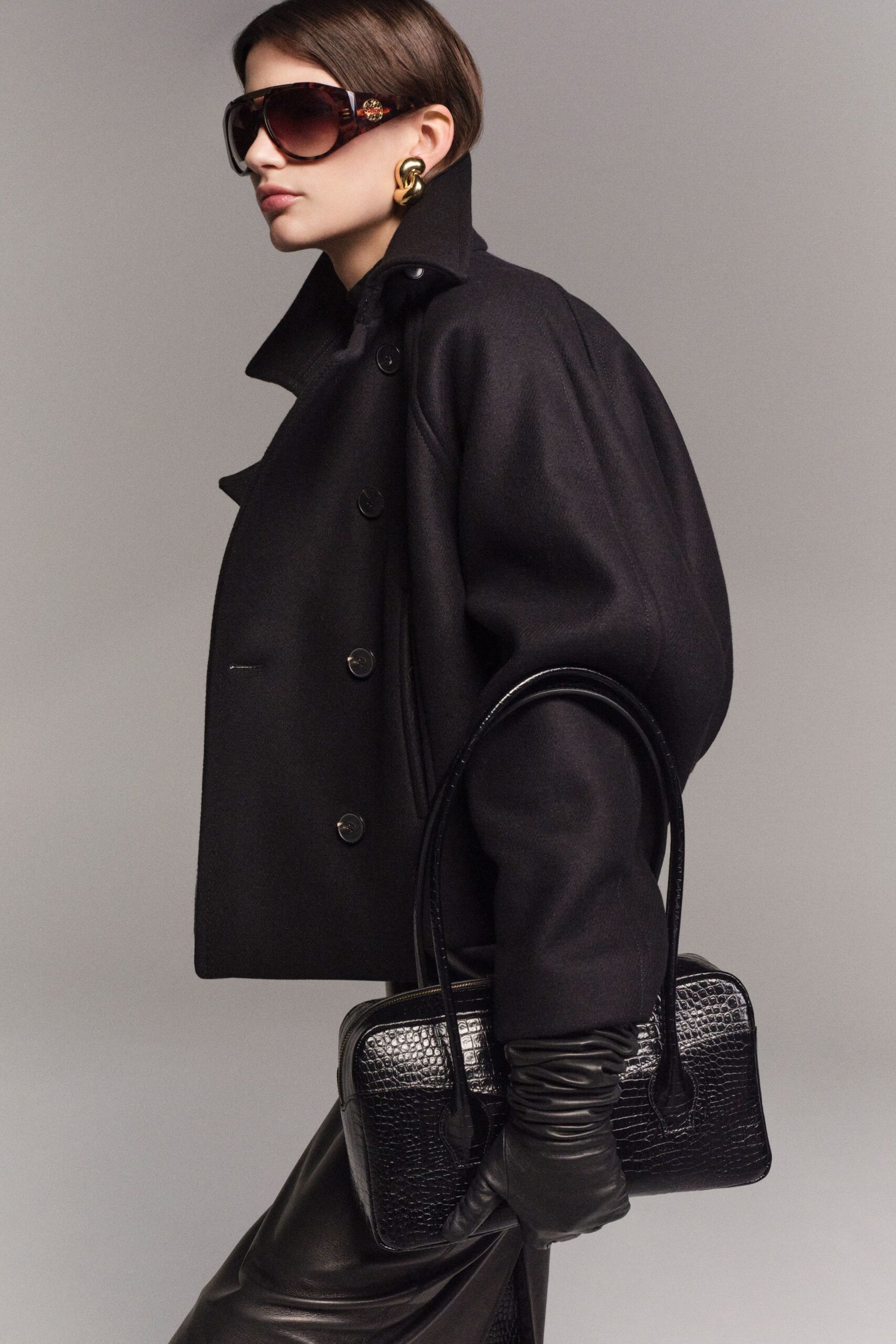 black wool long-sleeve collared oversized buttoned jacket