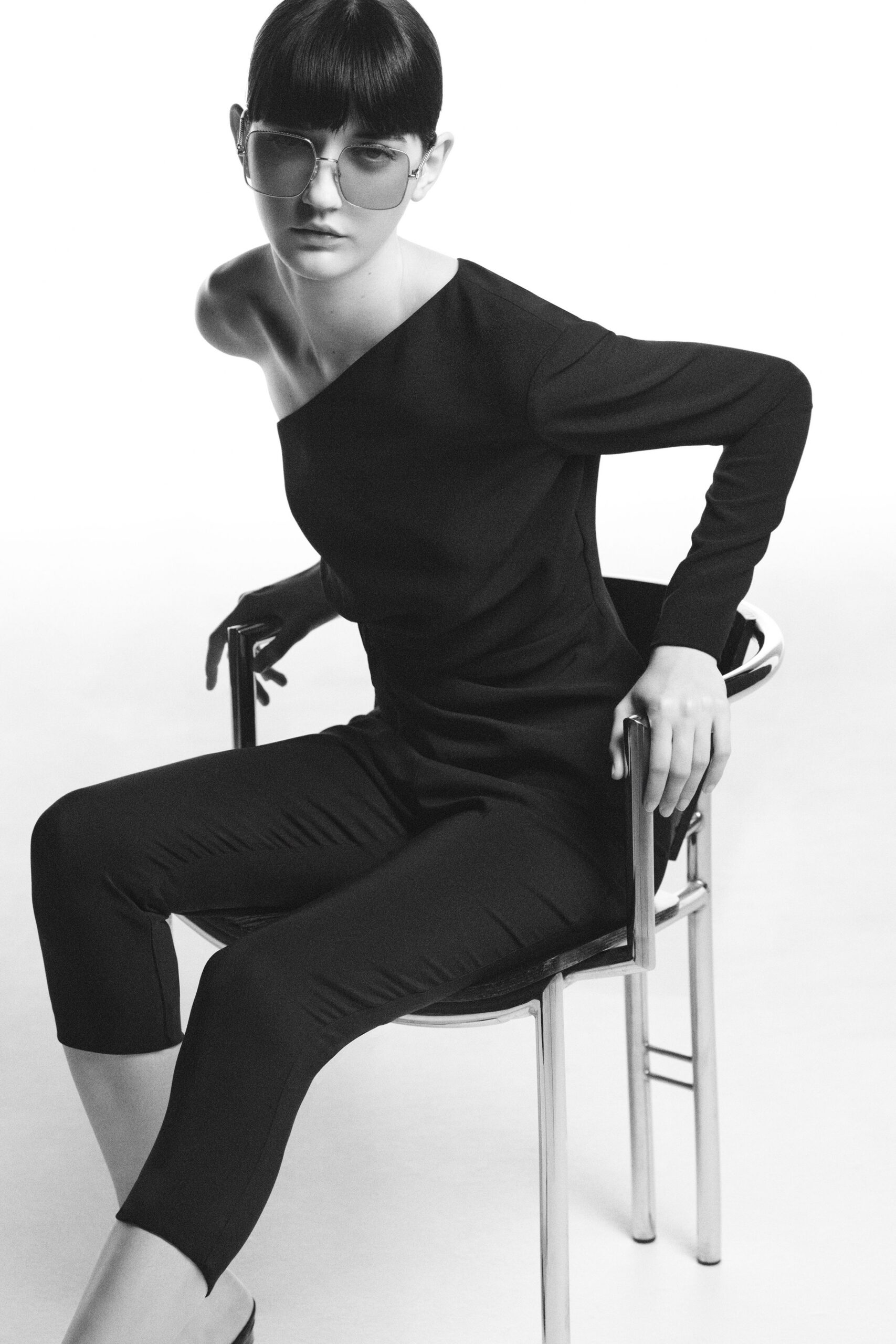 black cotton long-sleeve off-shoulder fitted straight-leg jumpsuit