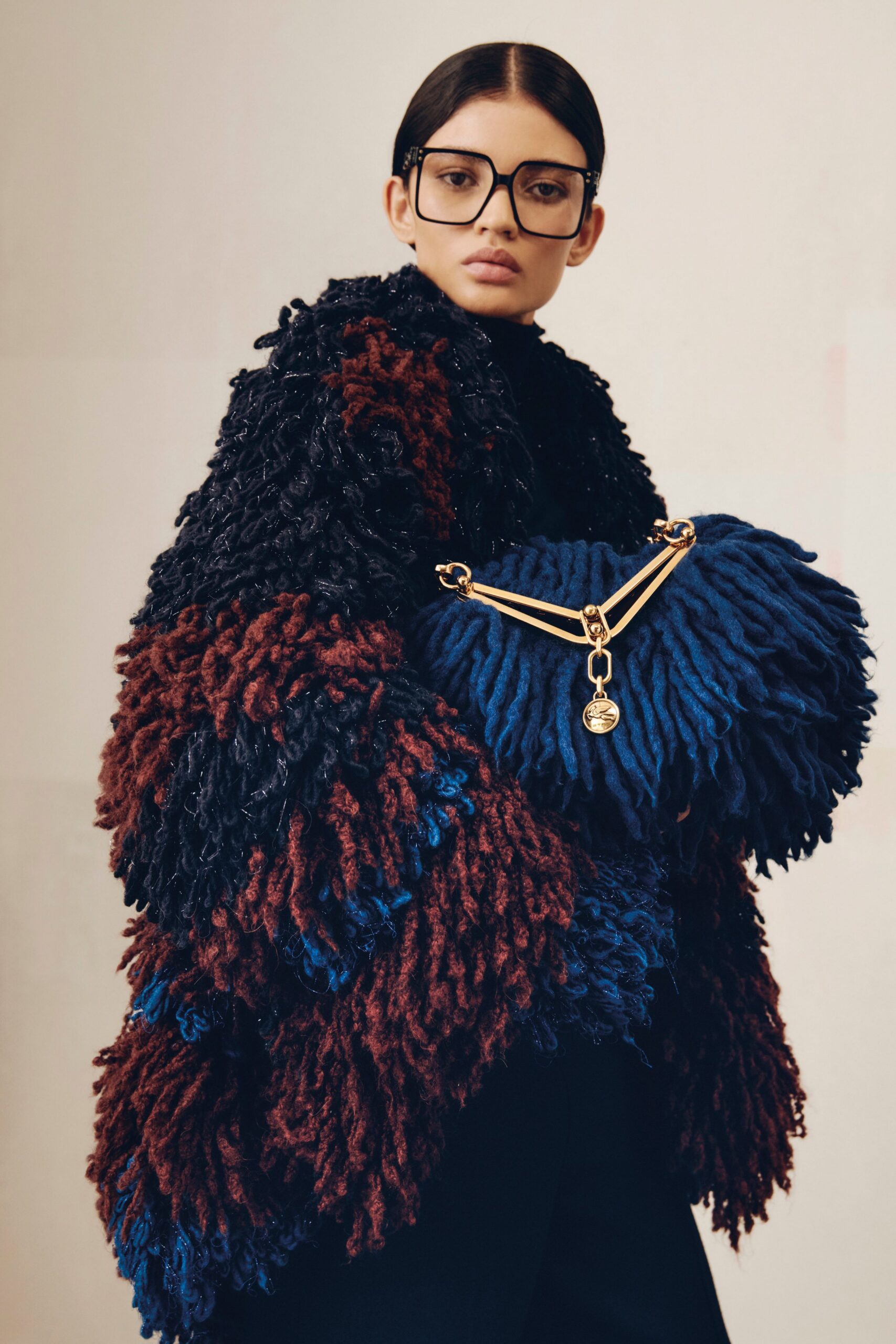 oversized wool coat with blue bag