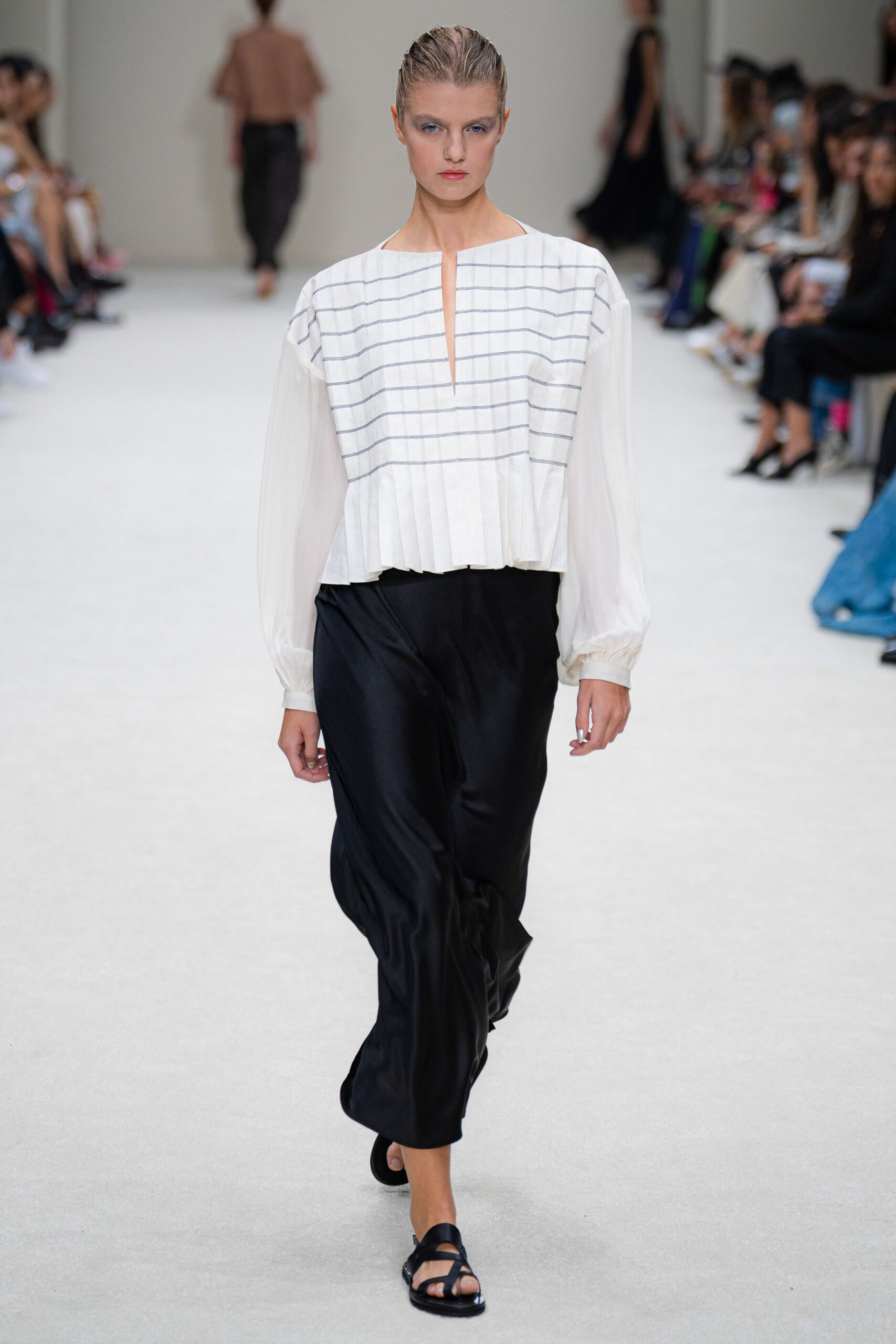 relaxed white top black pants