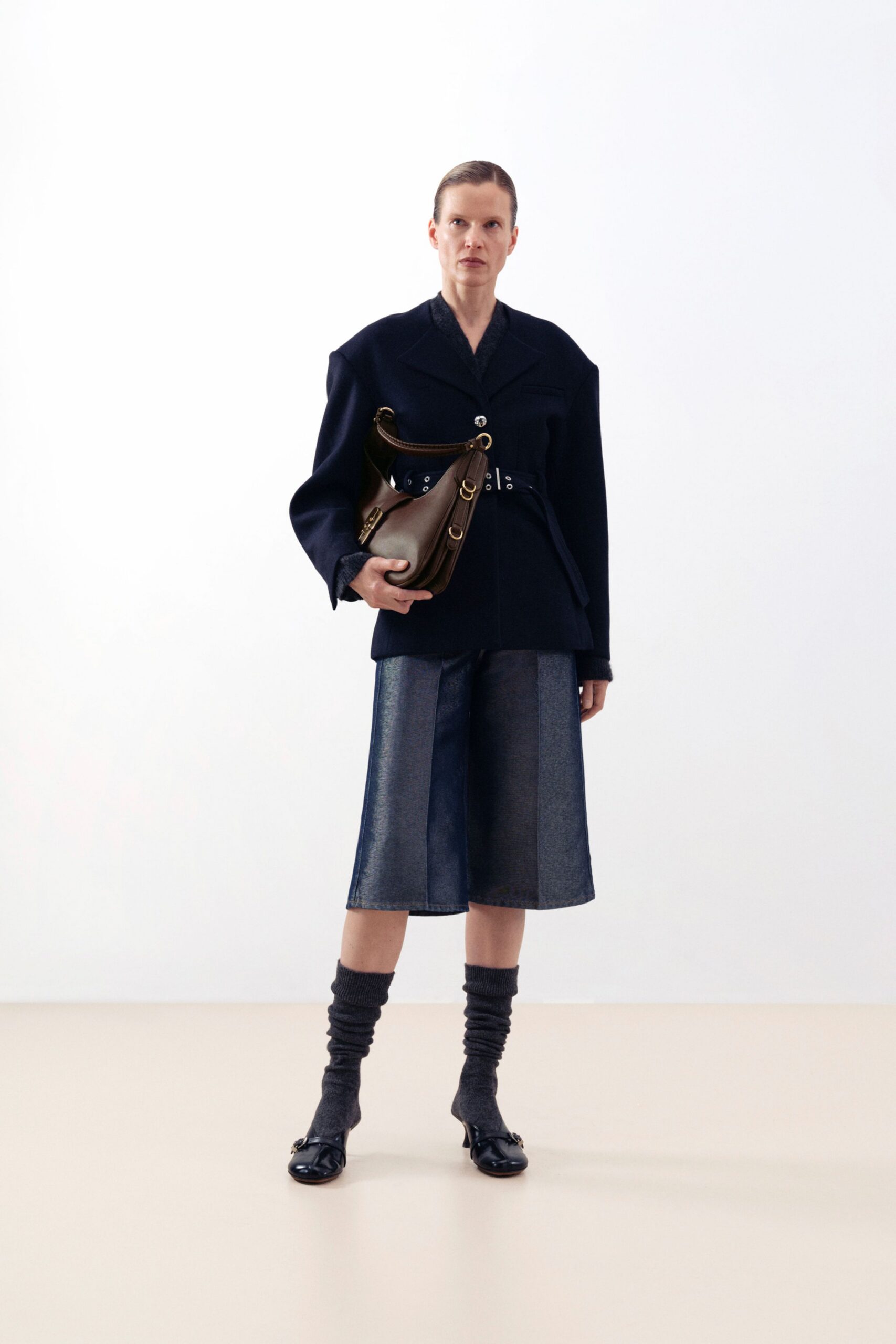 black wool long-sleeve collared oversized buttoned jacket