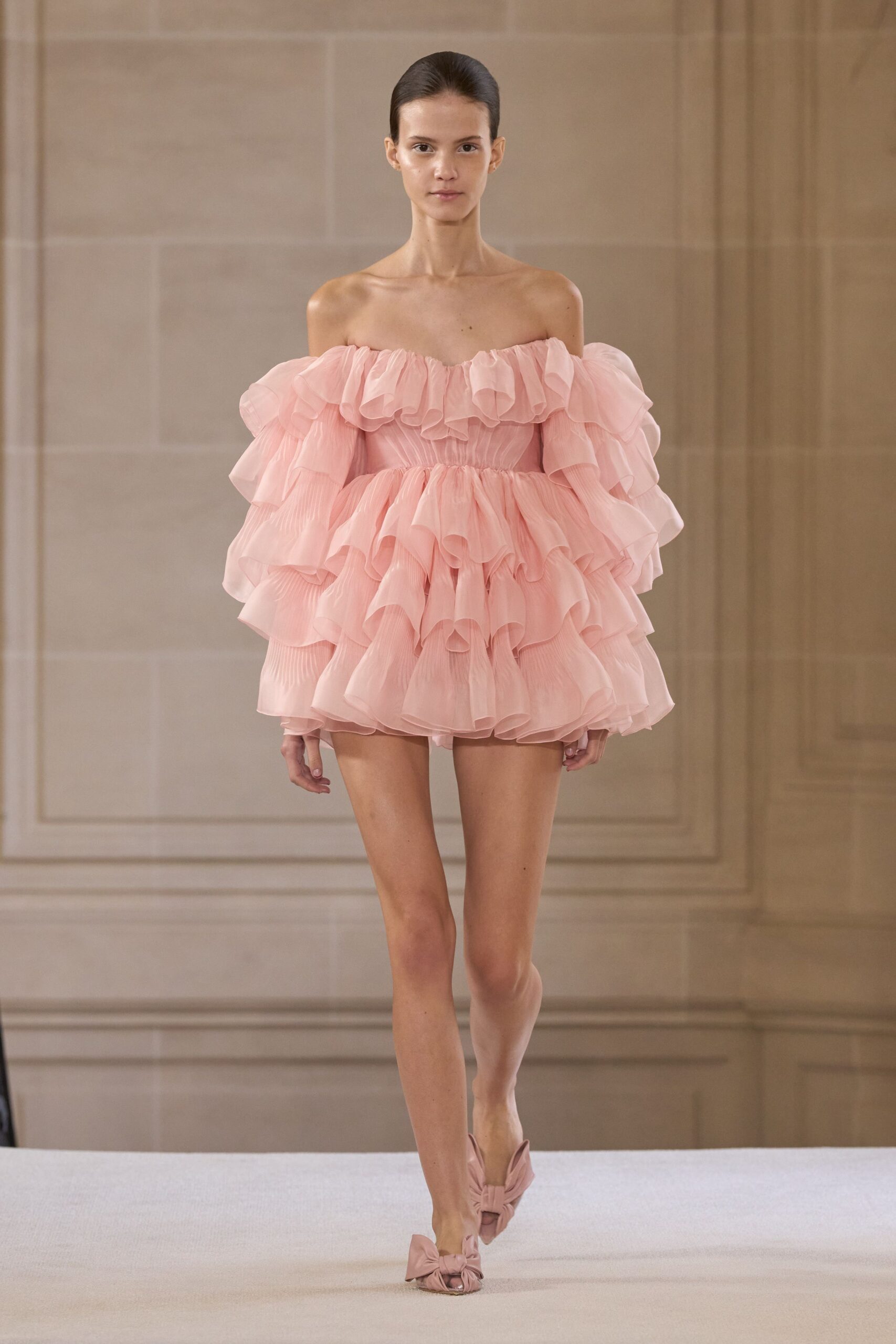pink silk sleeveless off-shoulder fitted ruffled pleated dress