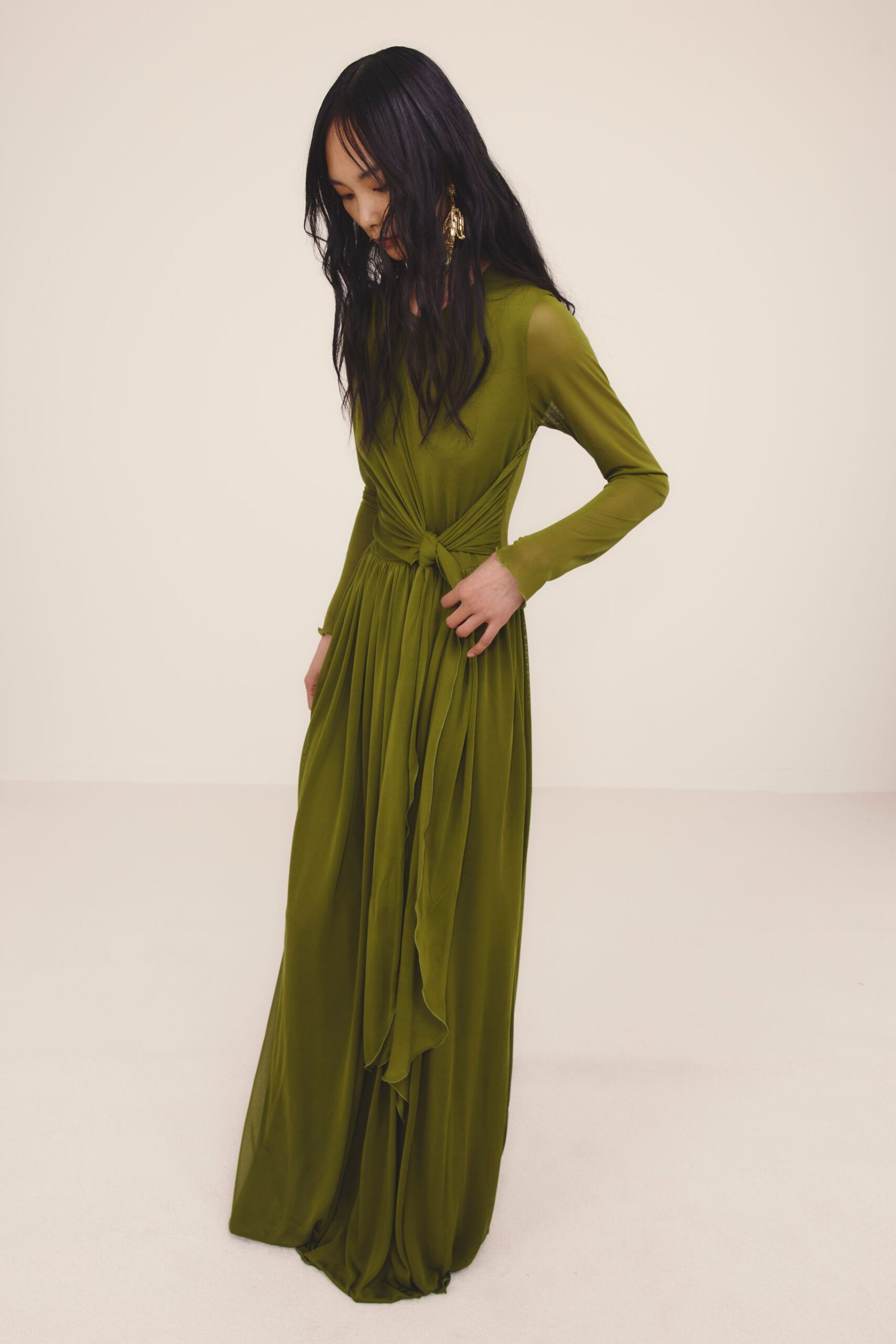green silk long-sleeve gown