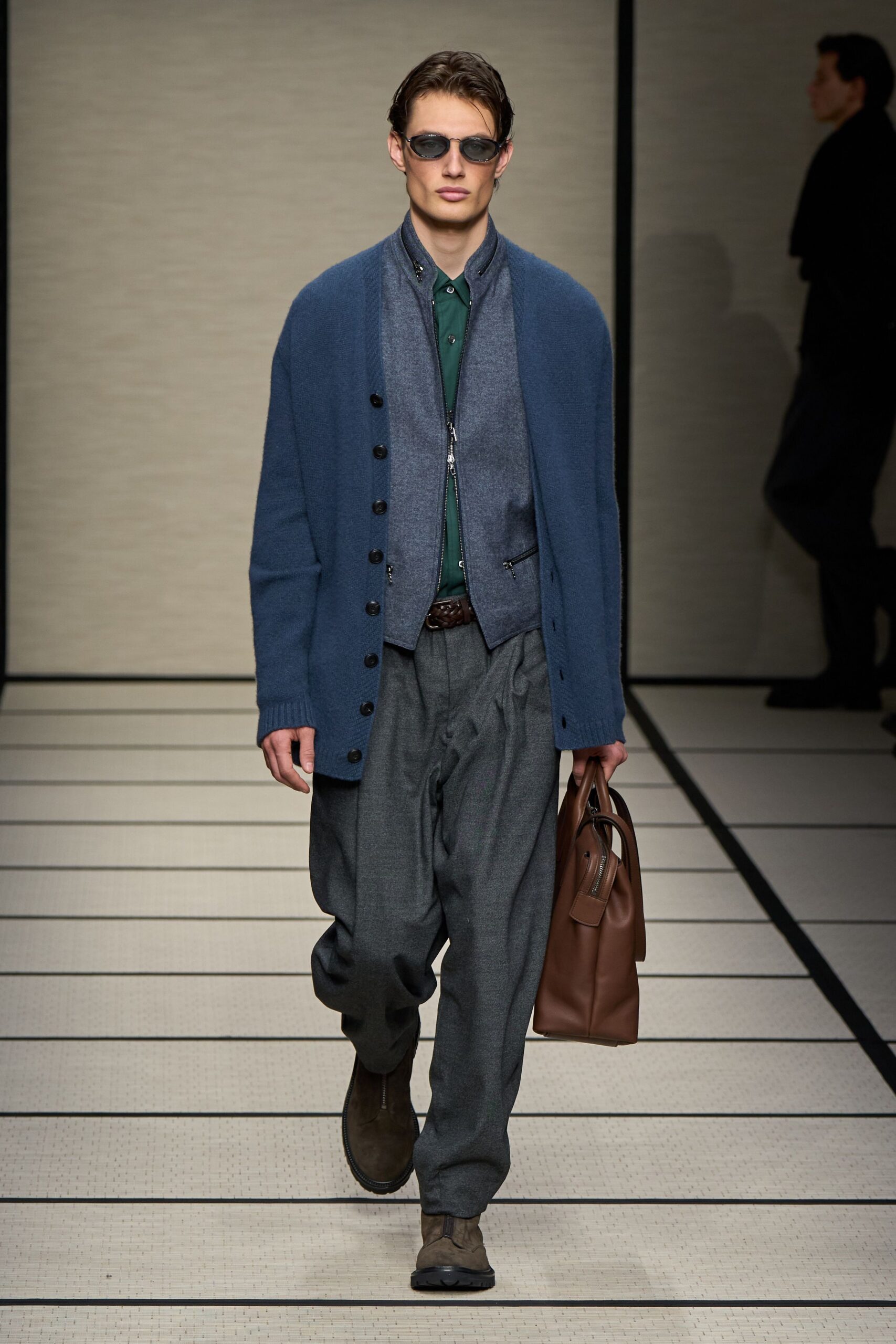 blue cardigan green shirt gray pants