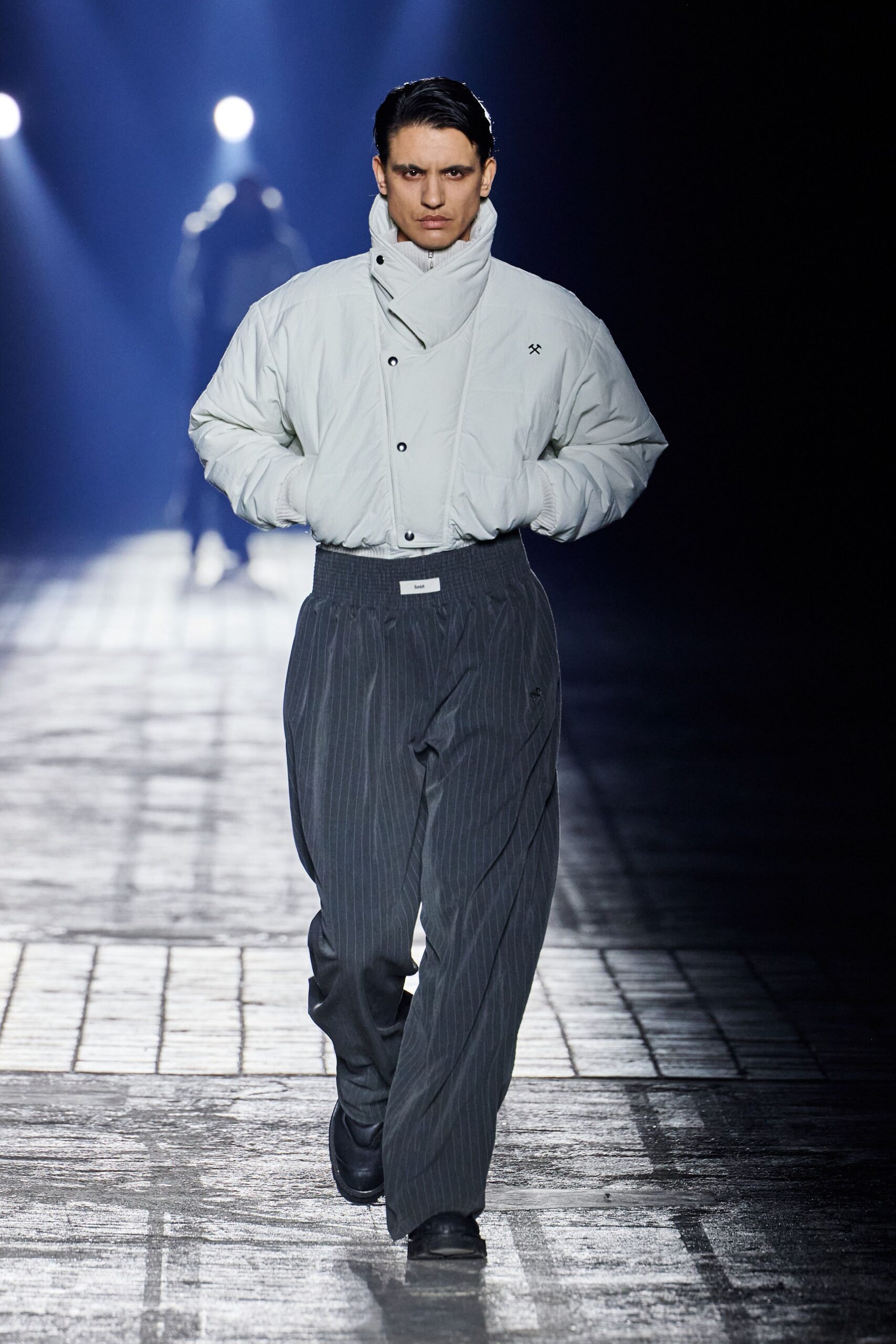 white relaxed jacket gray pants