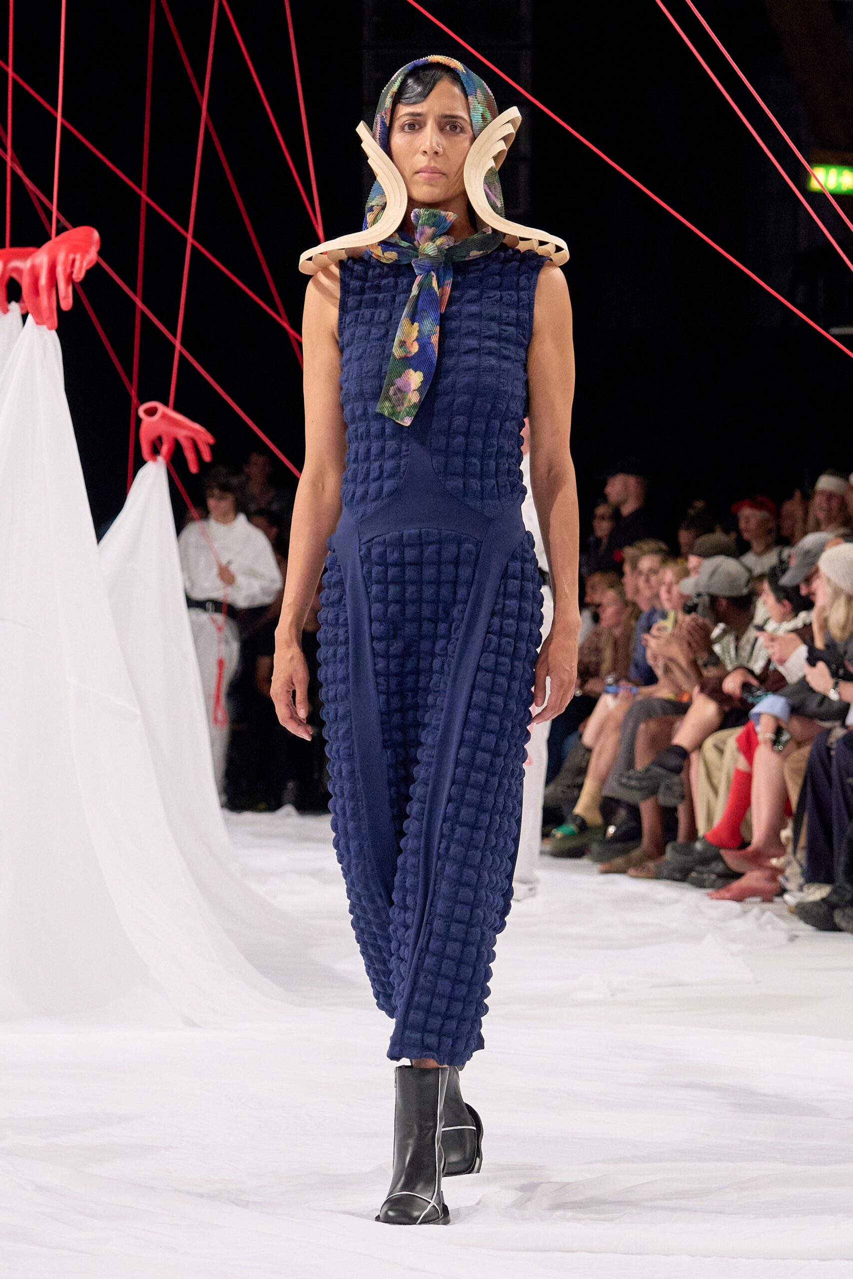 blue pleated jumpsuit with scarf