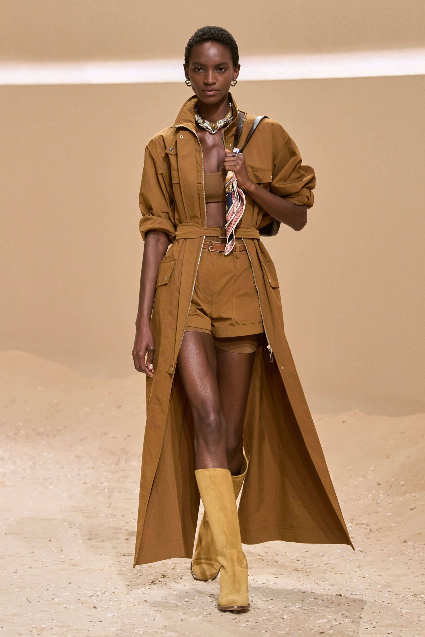 brown coat with yellow boots