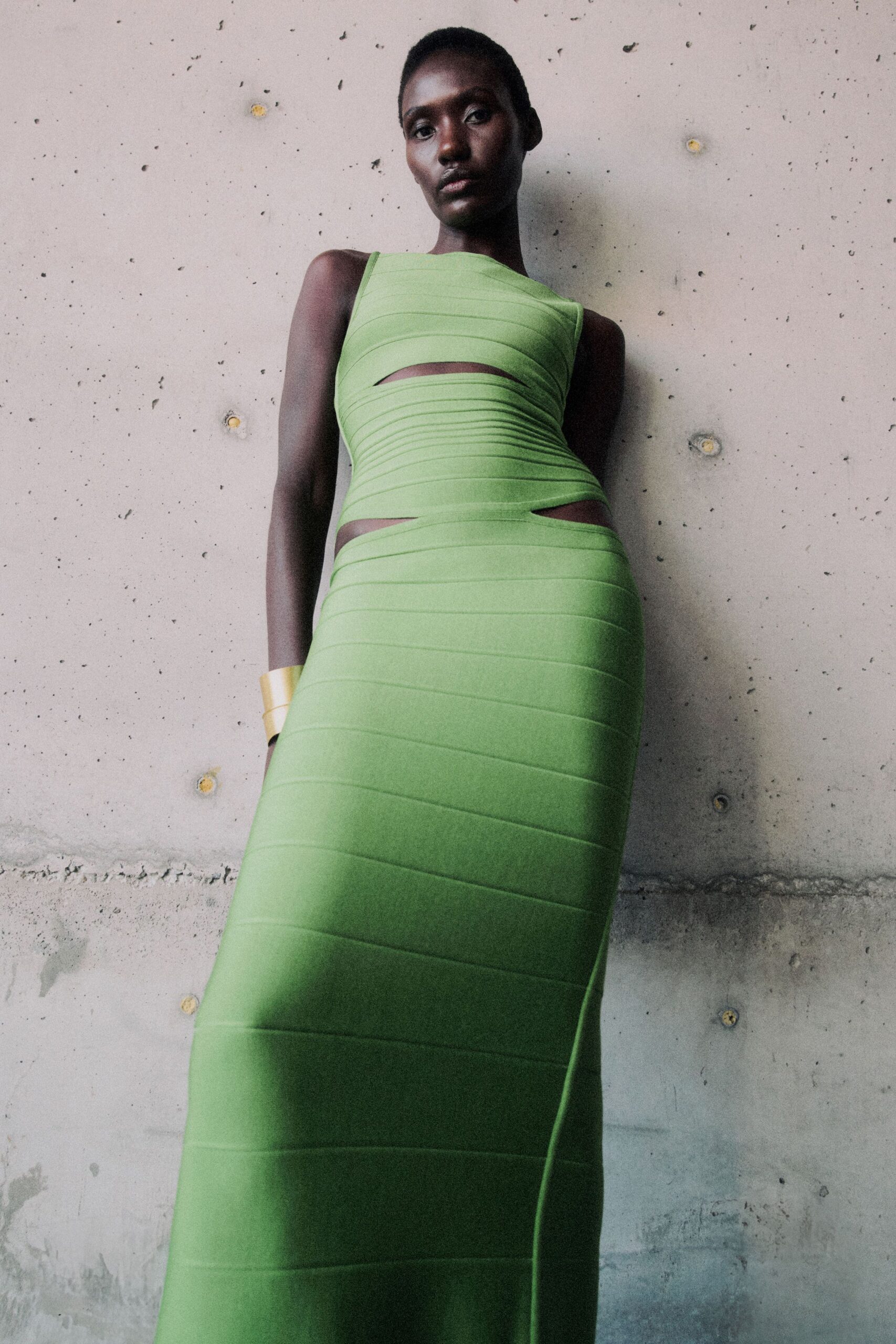 fitted green sleeveless gown