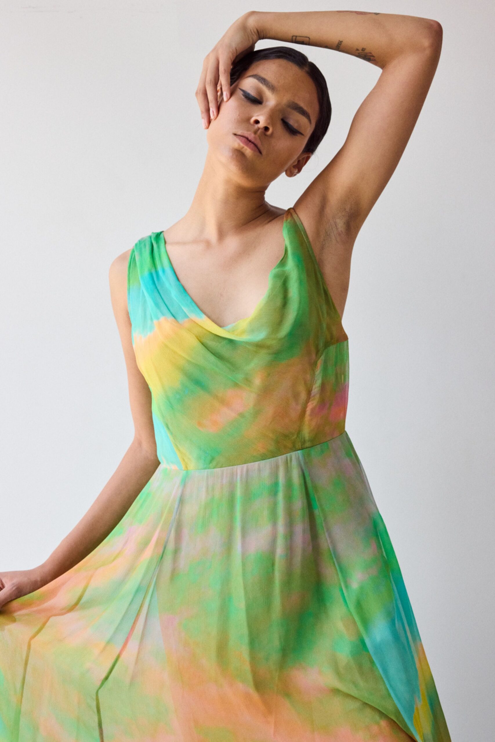 green and orange pleated dress