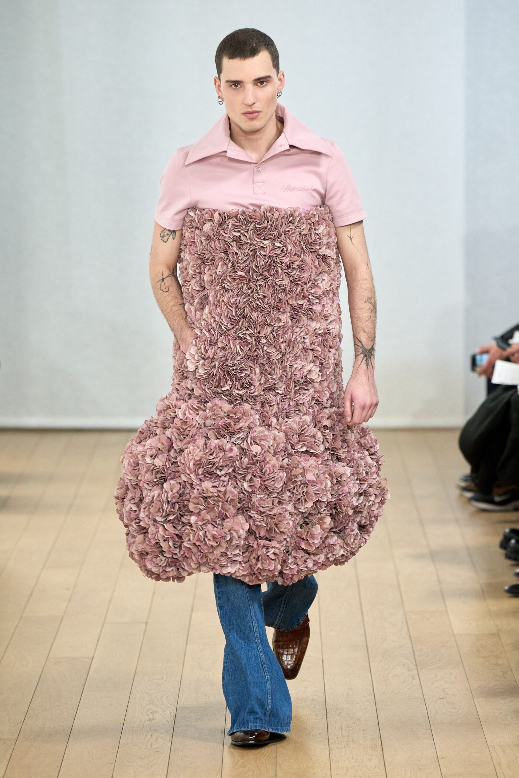 pink layered mini dress with denim pants