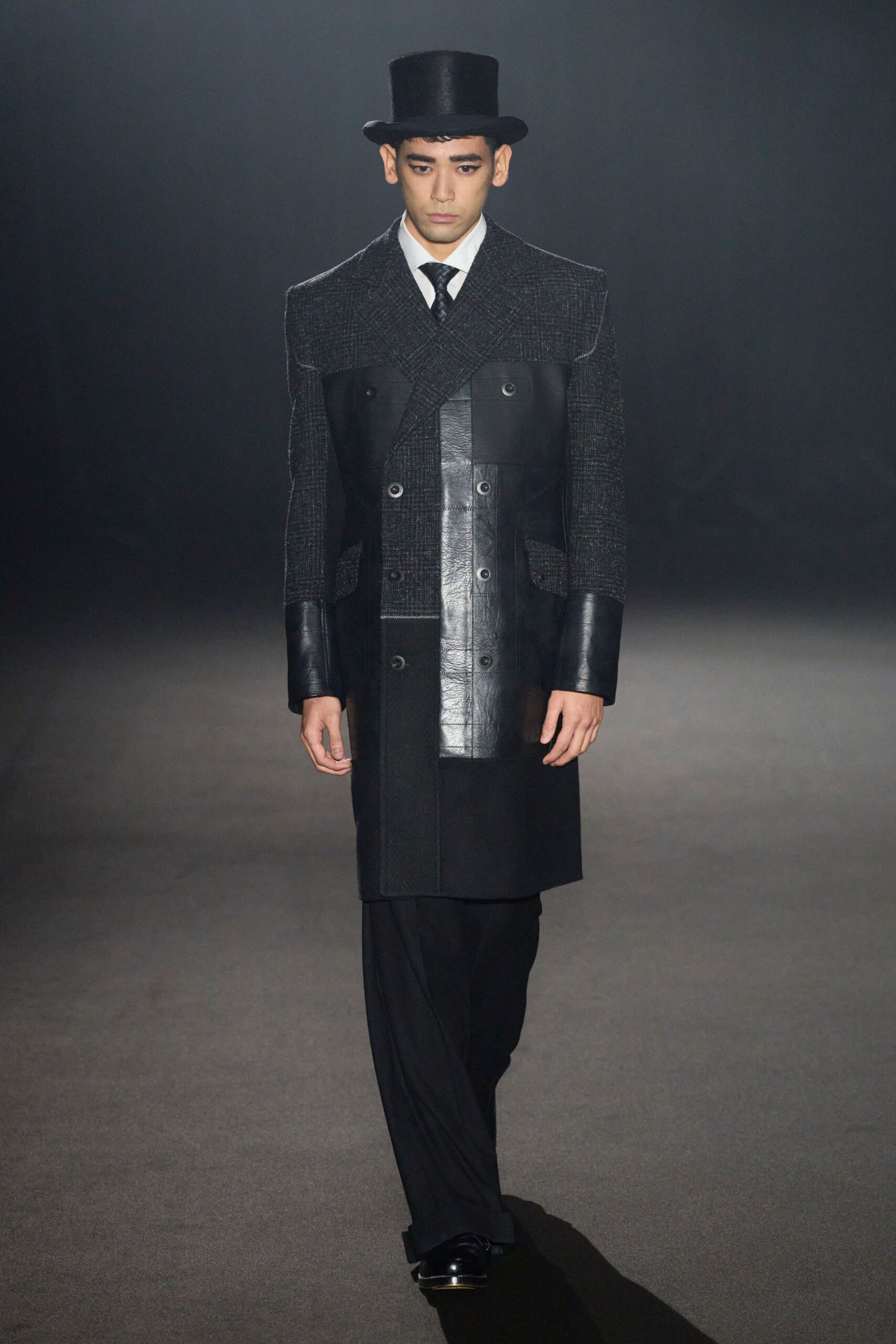 black leather long-sleeve double-breasted structured pleated coat