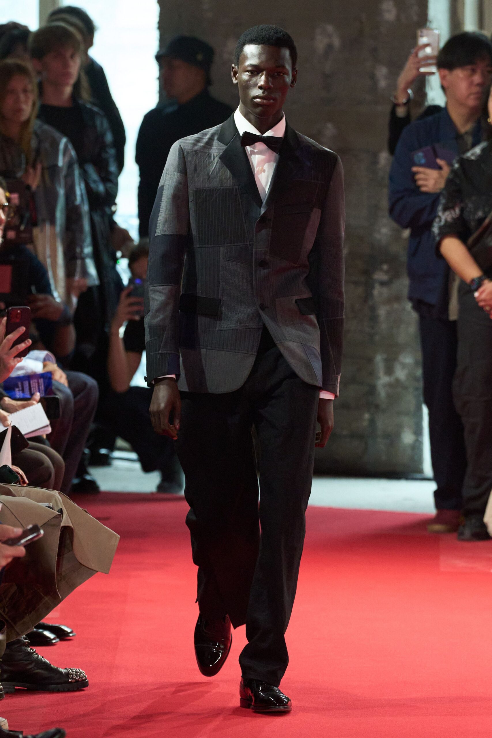 tailored gray suit with black pants