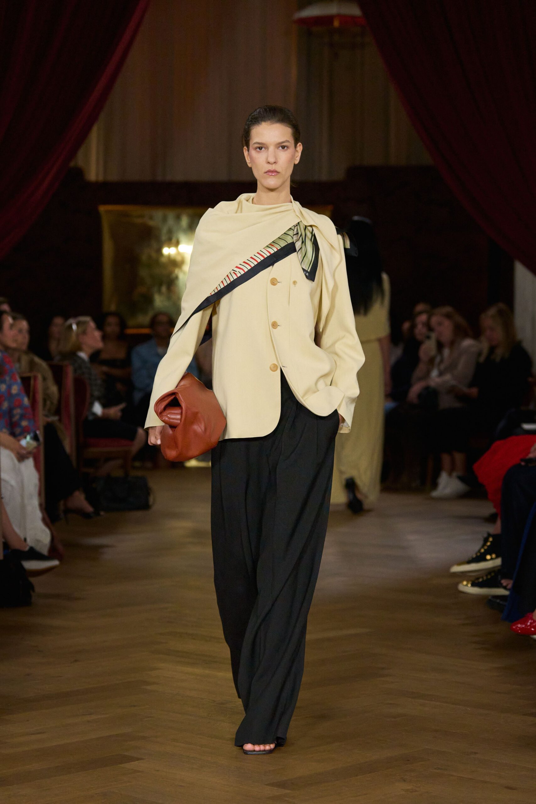 beige blazer black pants