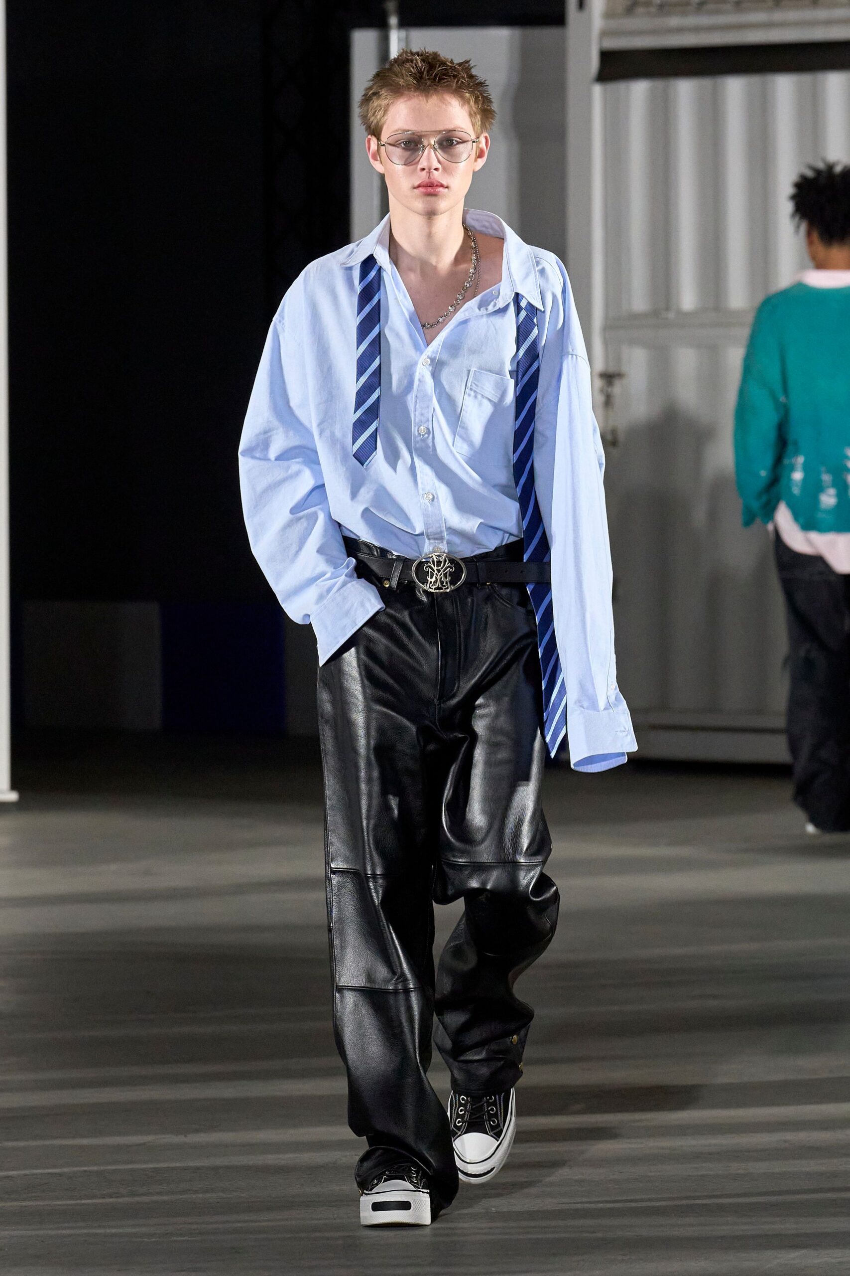 light blue shirt black leather pants