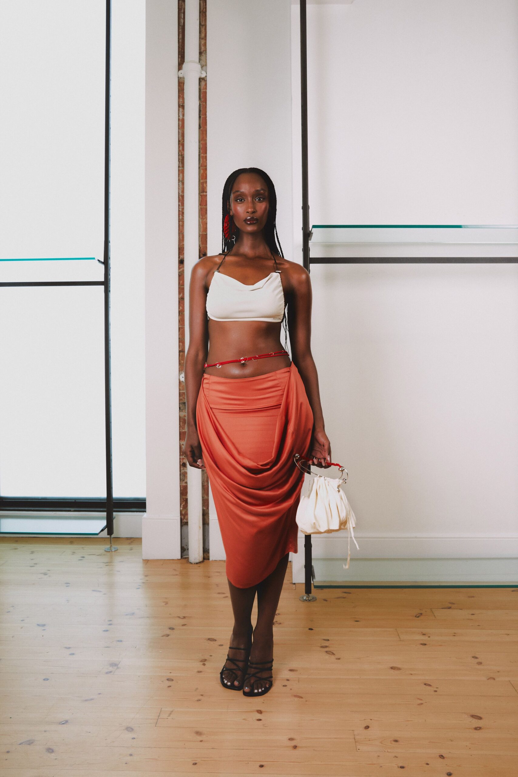 white halter top orange draped skirt
