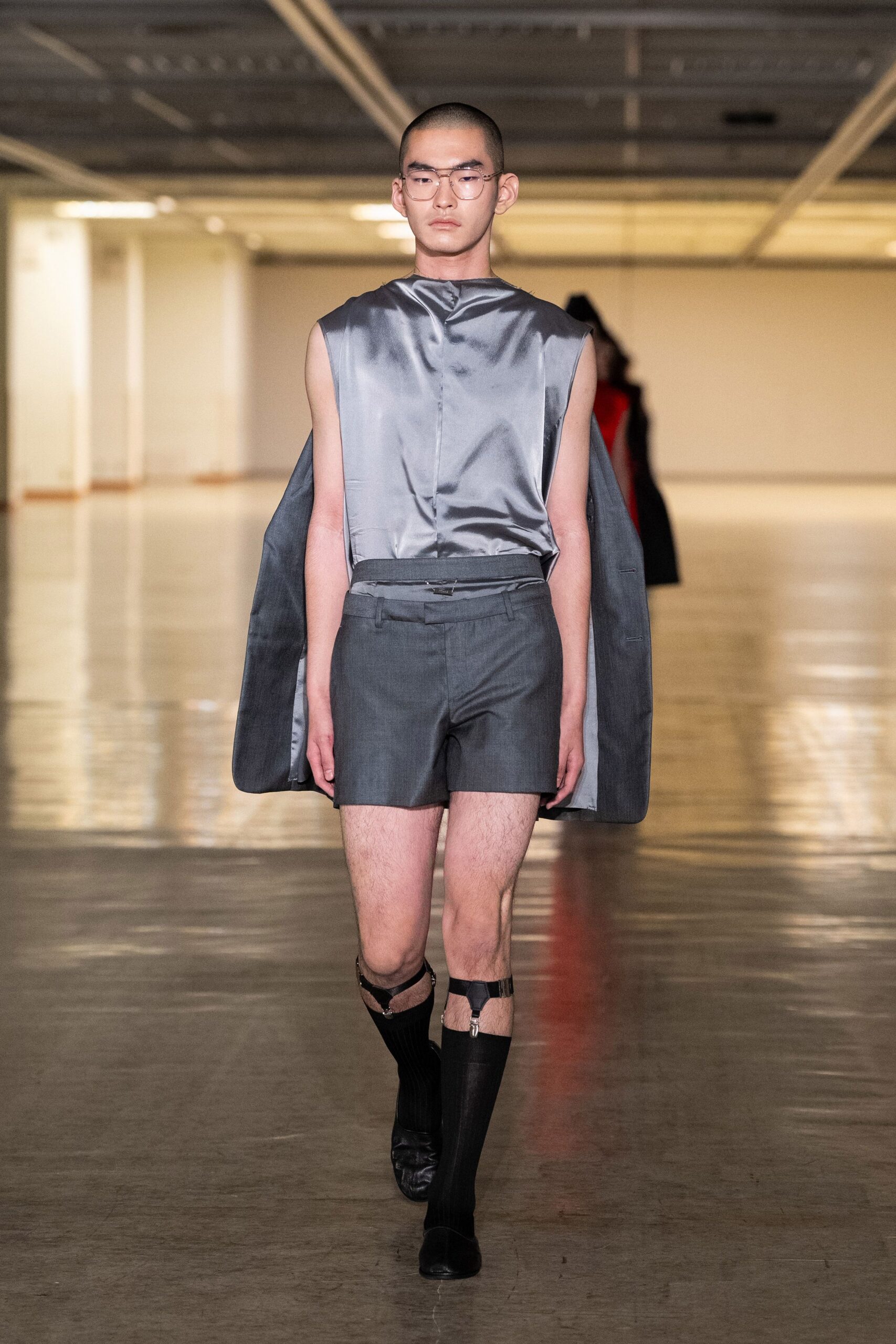 gray silk sleeveless high-neck fitted draped top