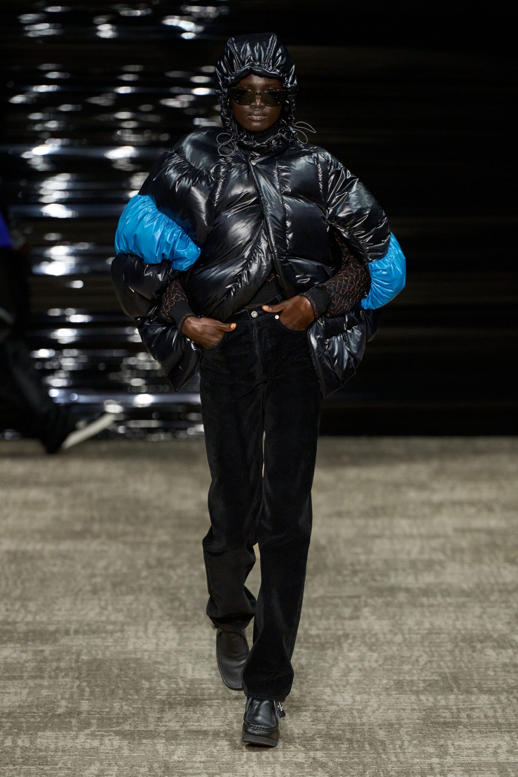black vinyl jacket with blue accents
