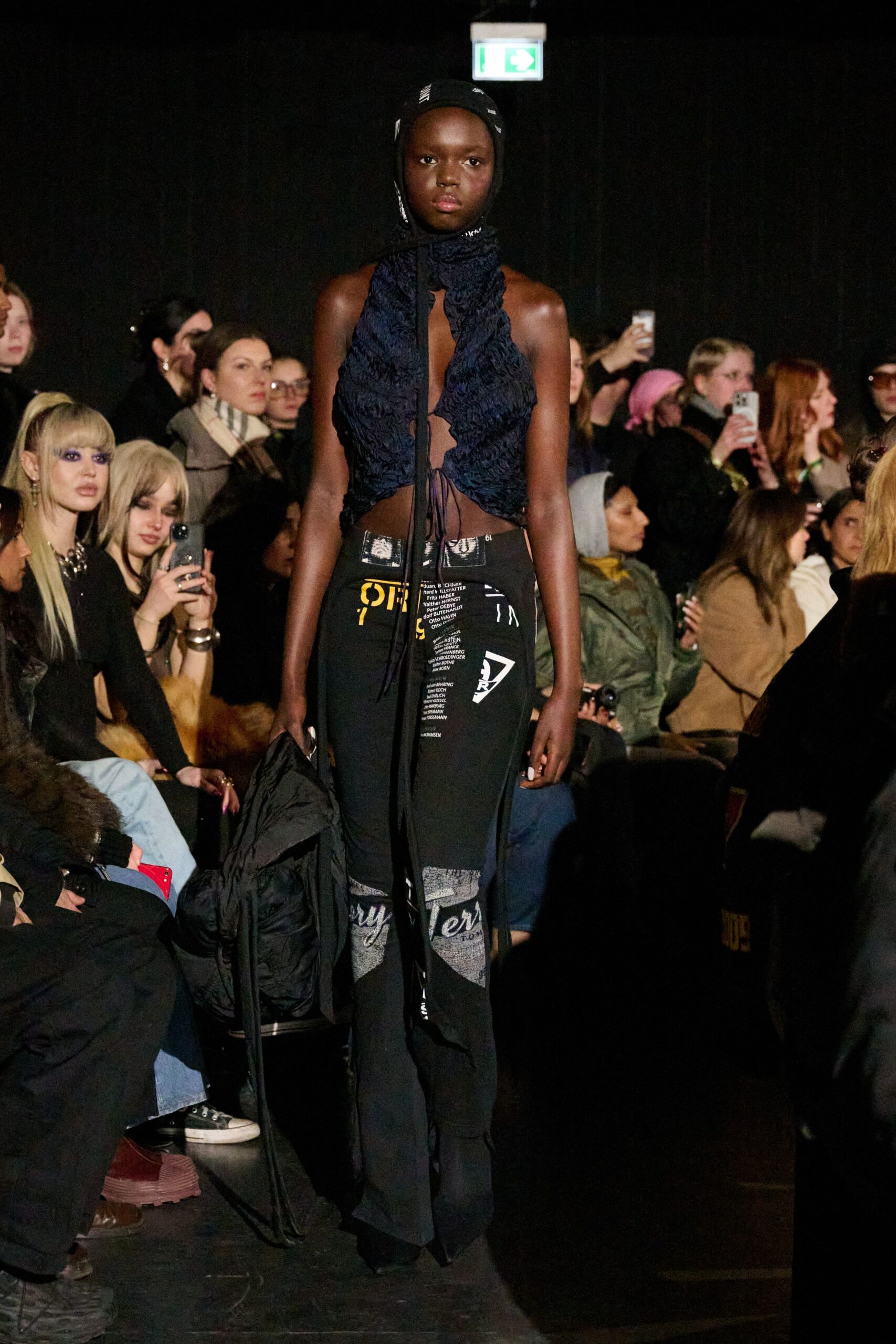 black lace top with flared pants