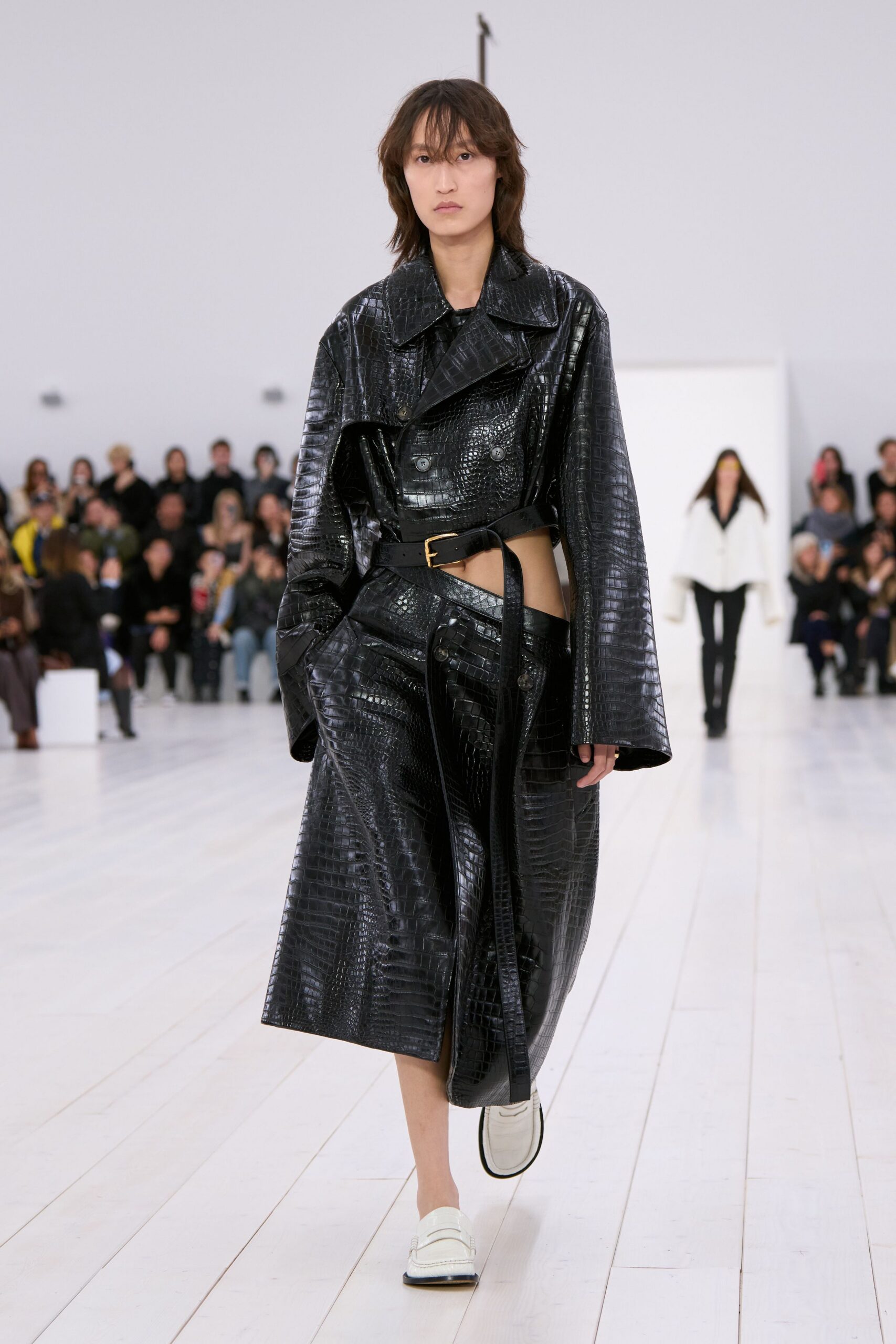 black leather long-sleeve collared relaxed zippered shiny coat