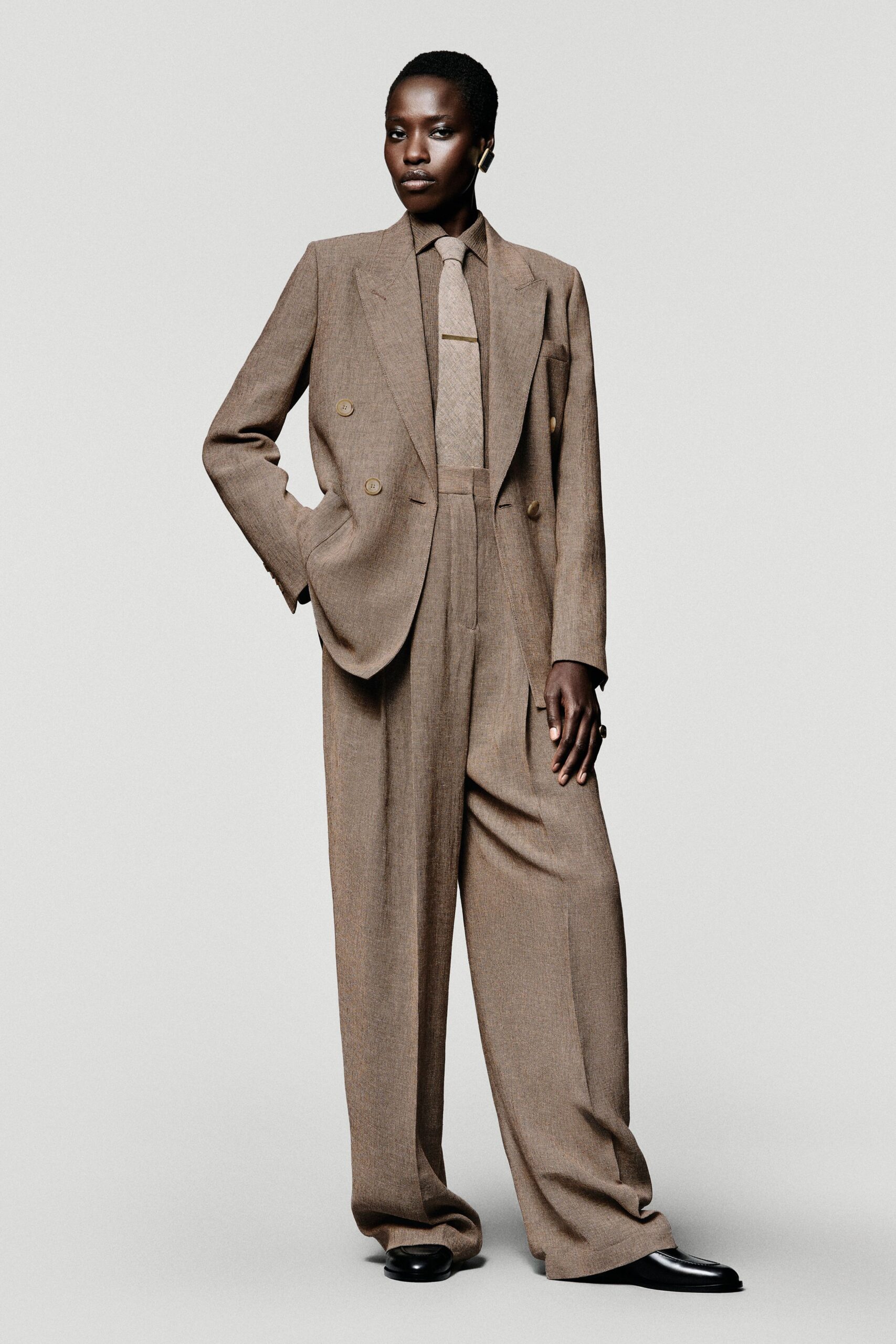 brown wool long-sleeve collared tailored buttoned pleated suit