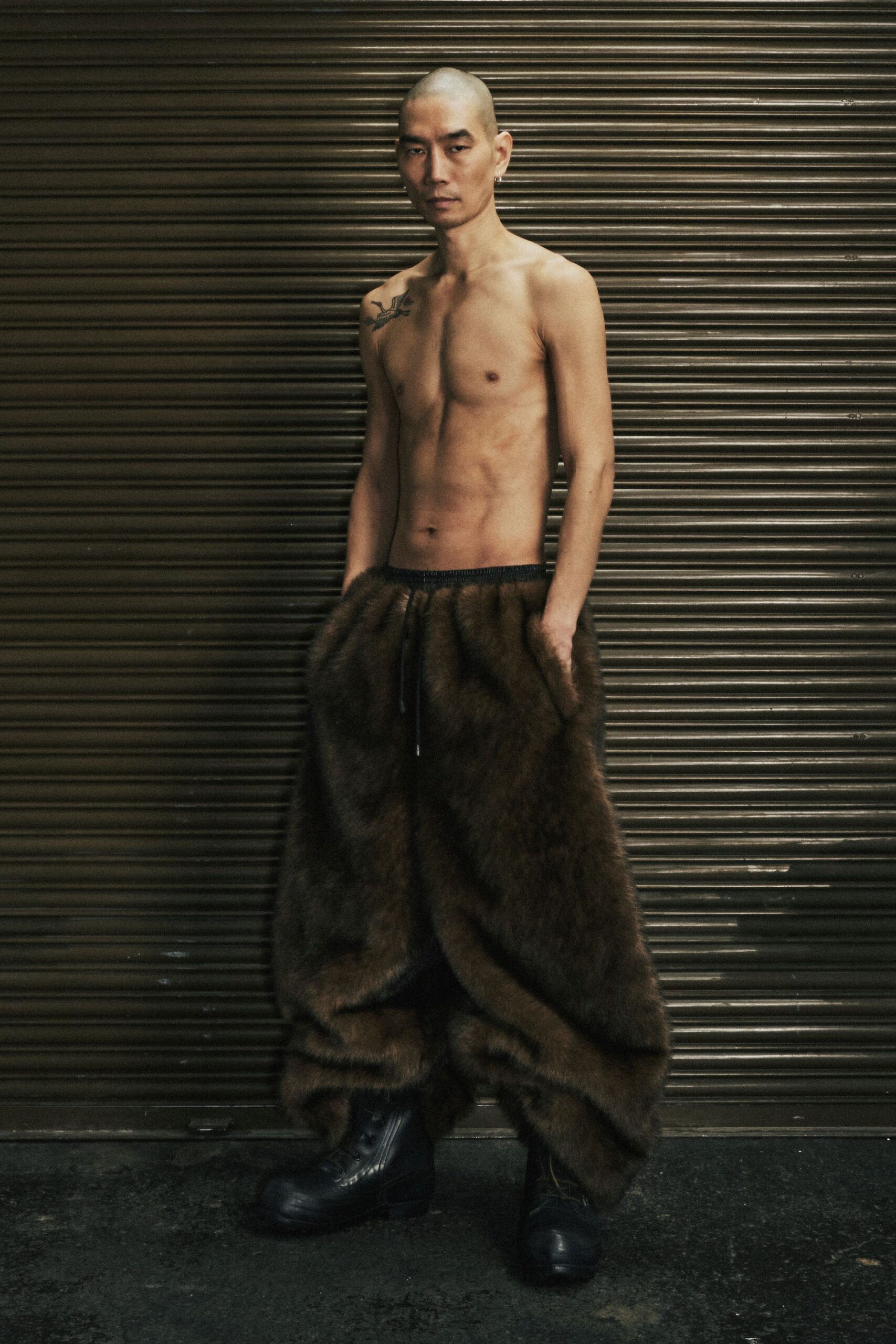 brown fur relaxed pants and black boots