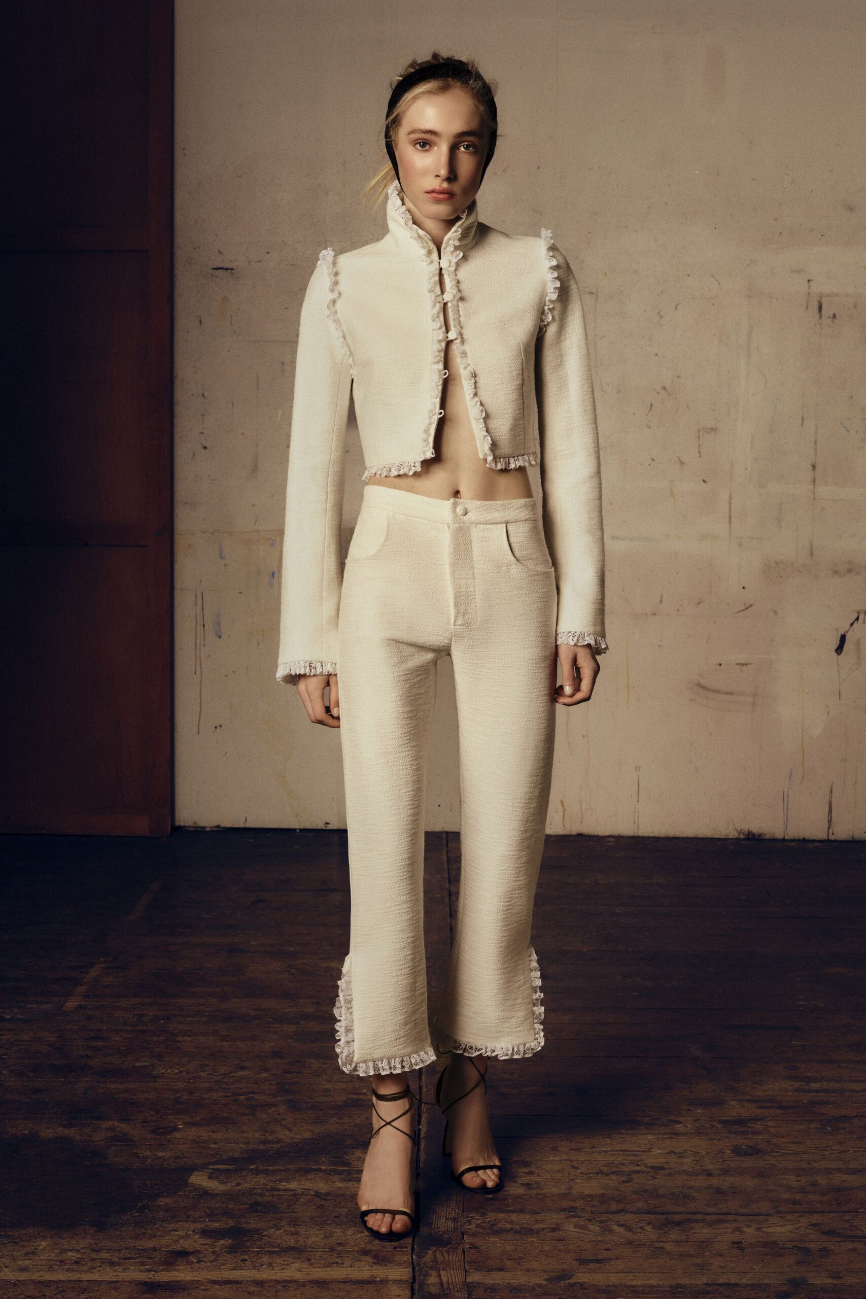 white cotton long-sleeve collared fitted ruffled cropped jacket