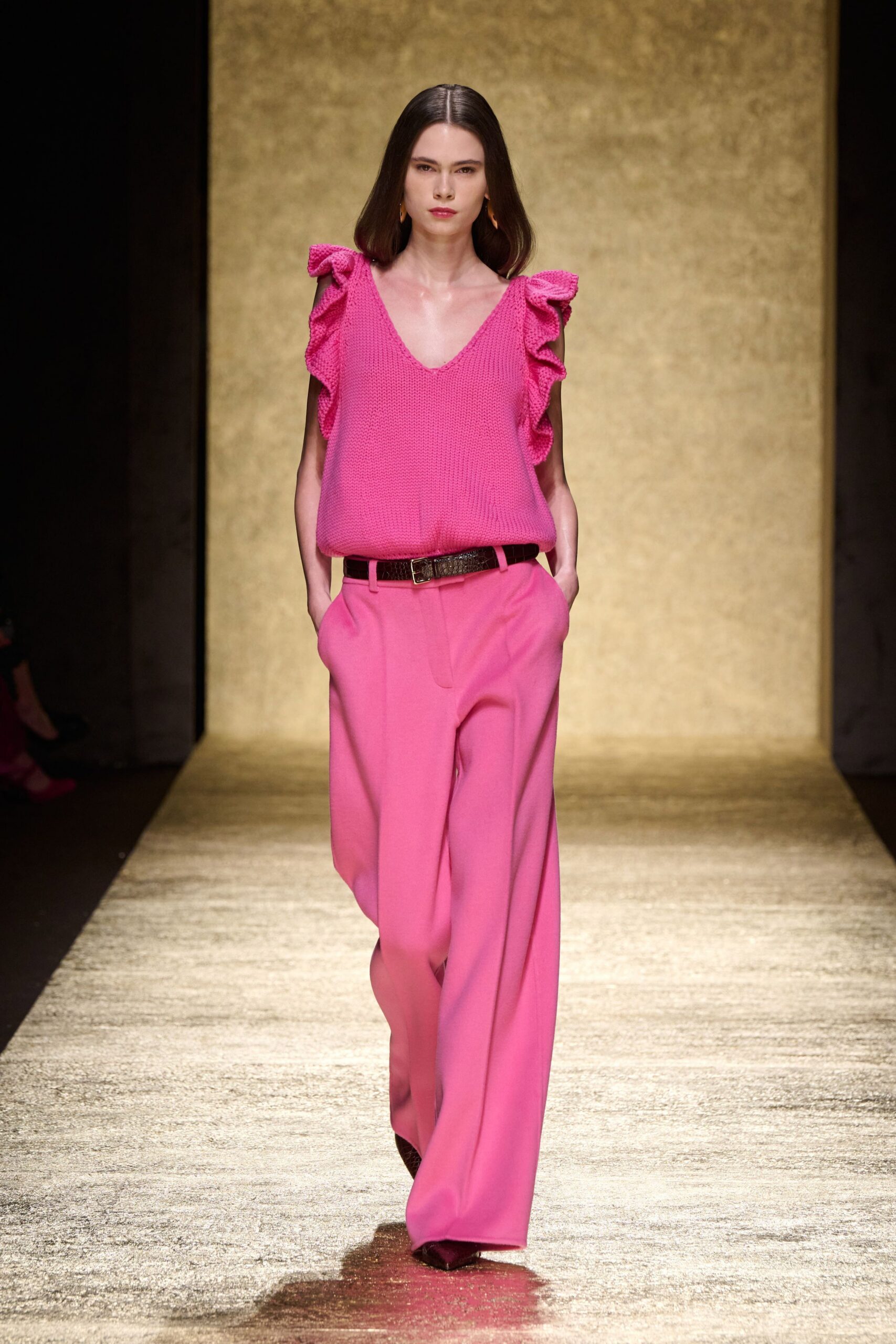 pink ruffled top with wide-leg pants