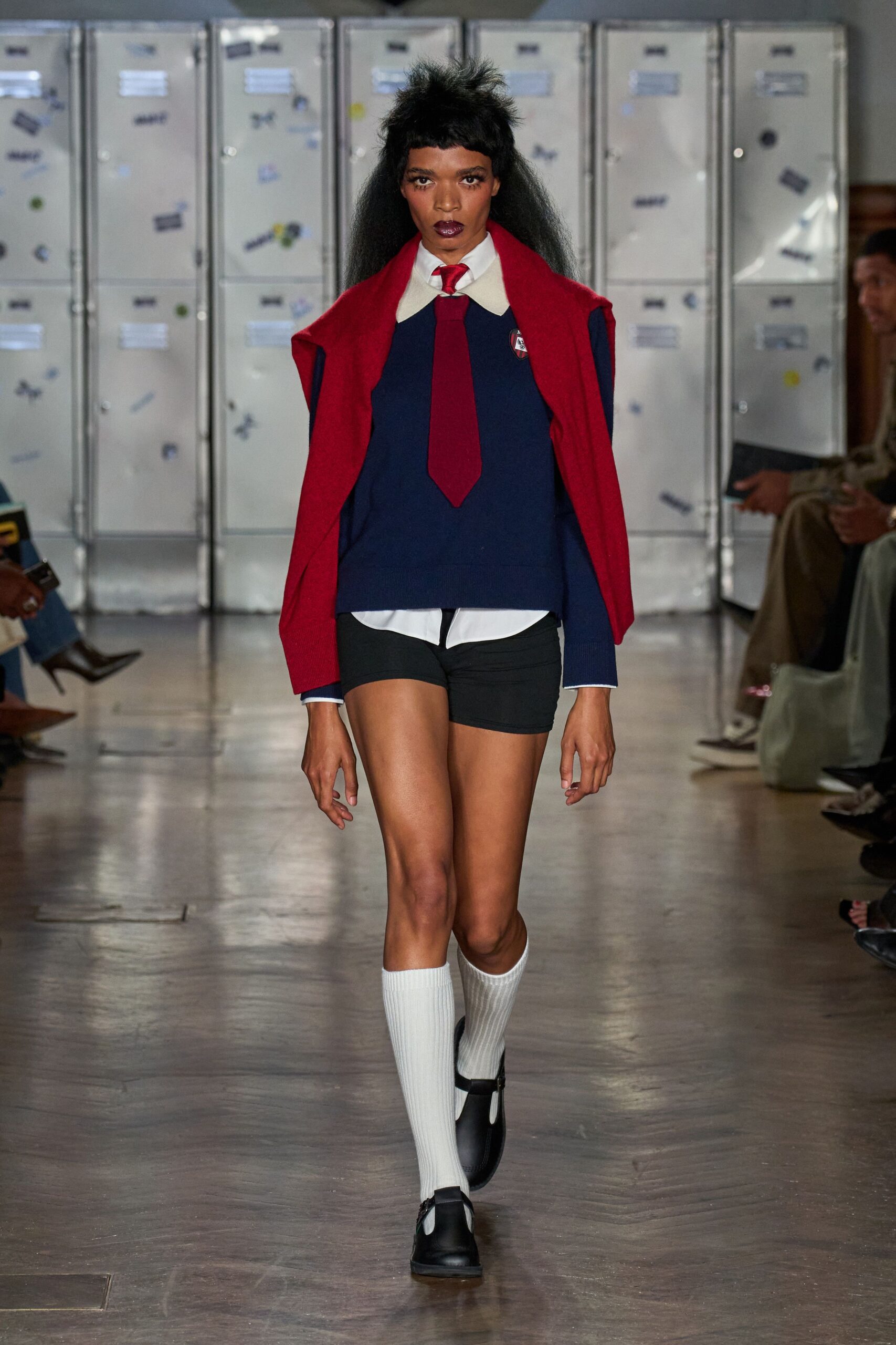 blue fitted top with red sweater