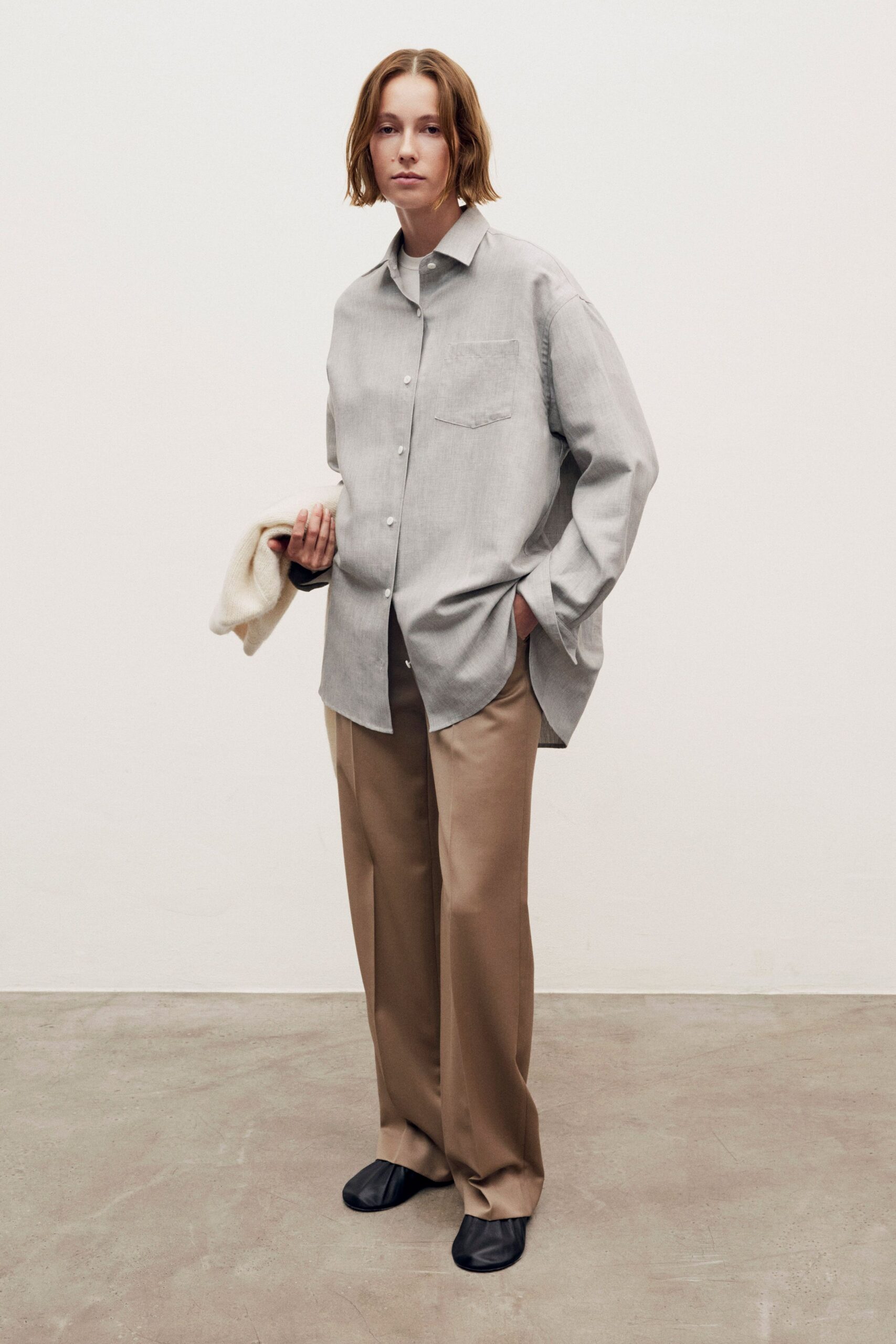 gray relaxed shirt beige pants