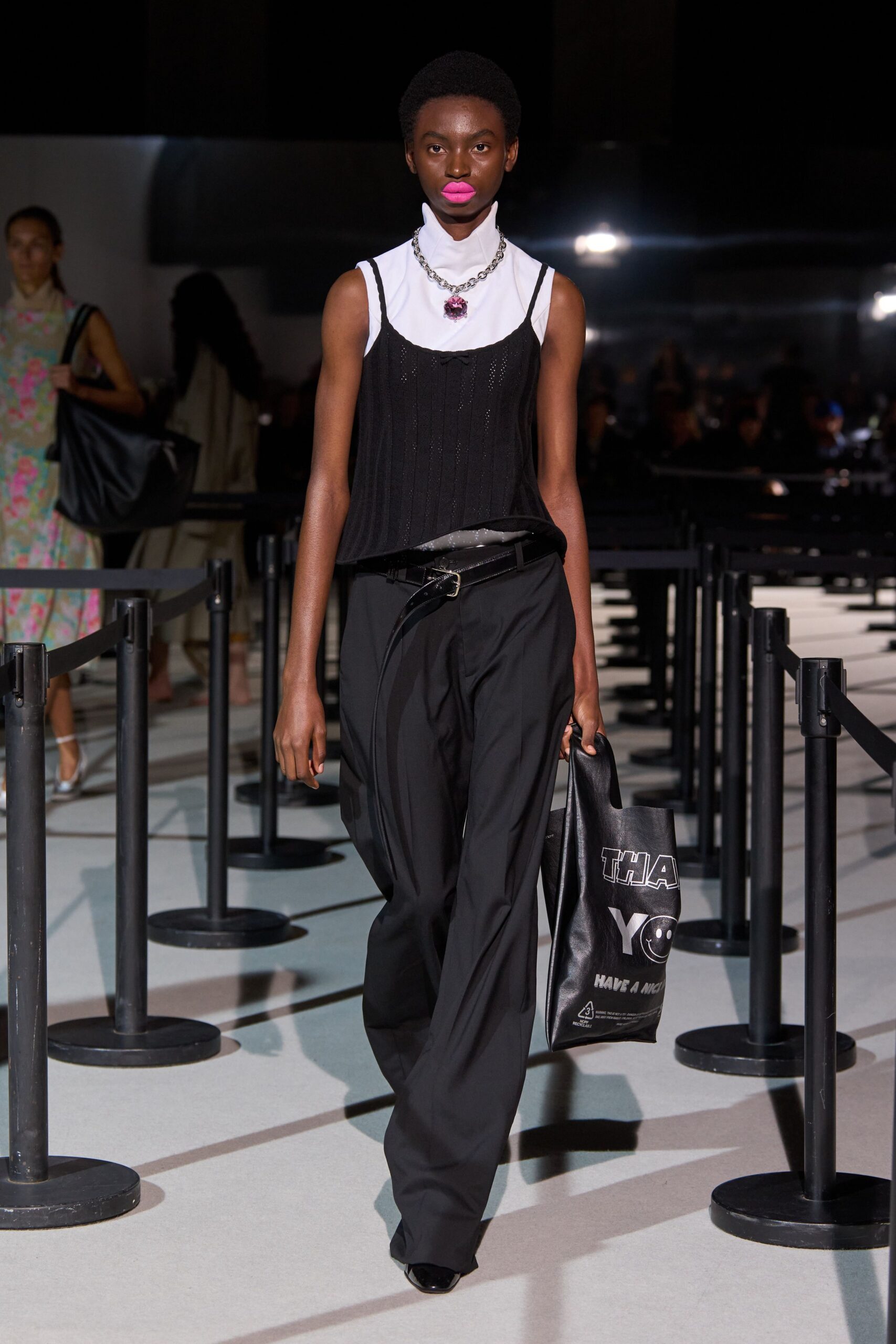 black fitted top and relaxed pants