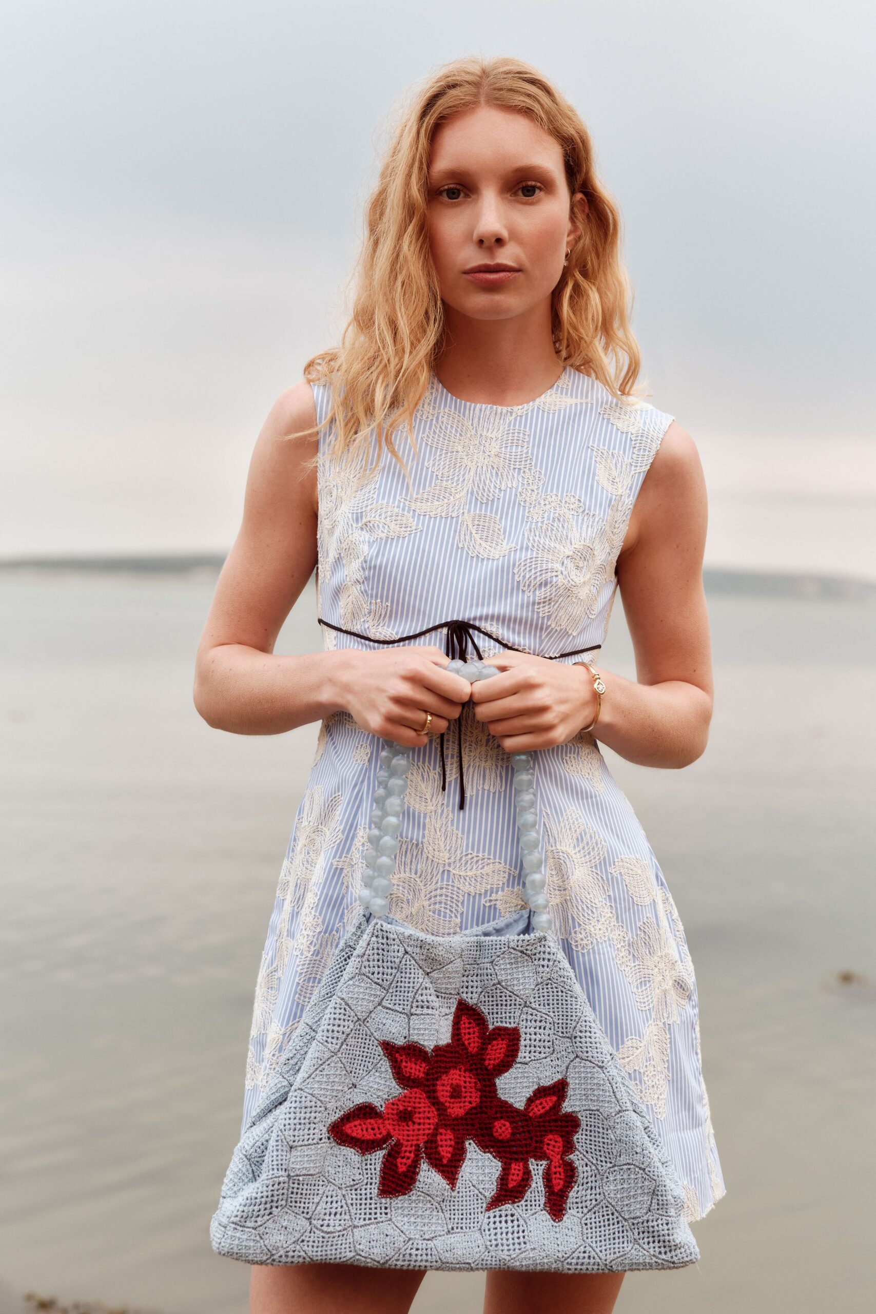 blue and white embroidered mini dress with bag
