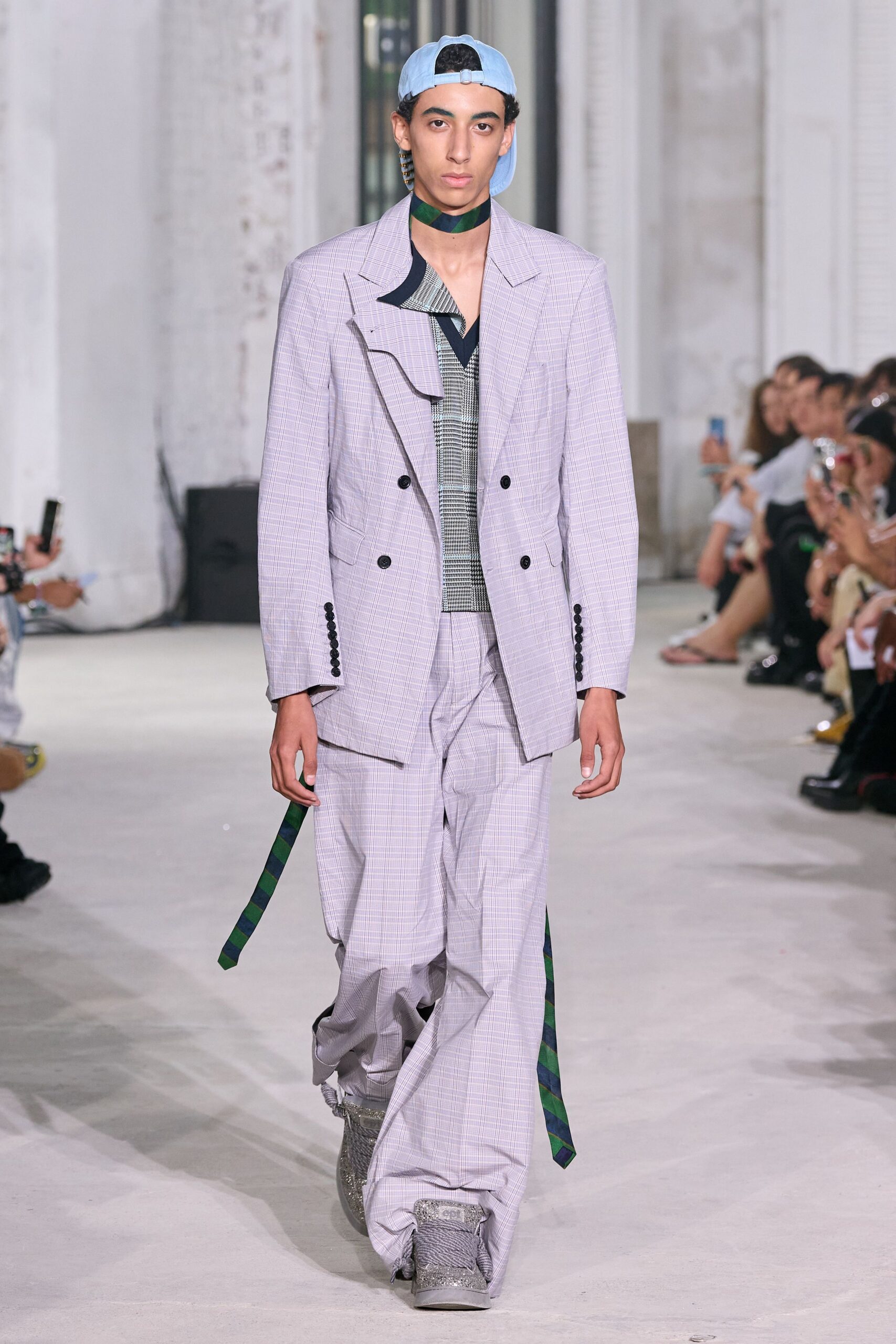 gray tailored suit with cap