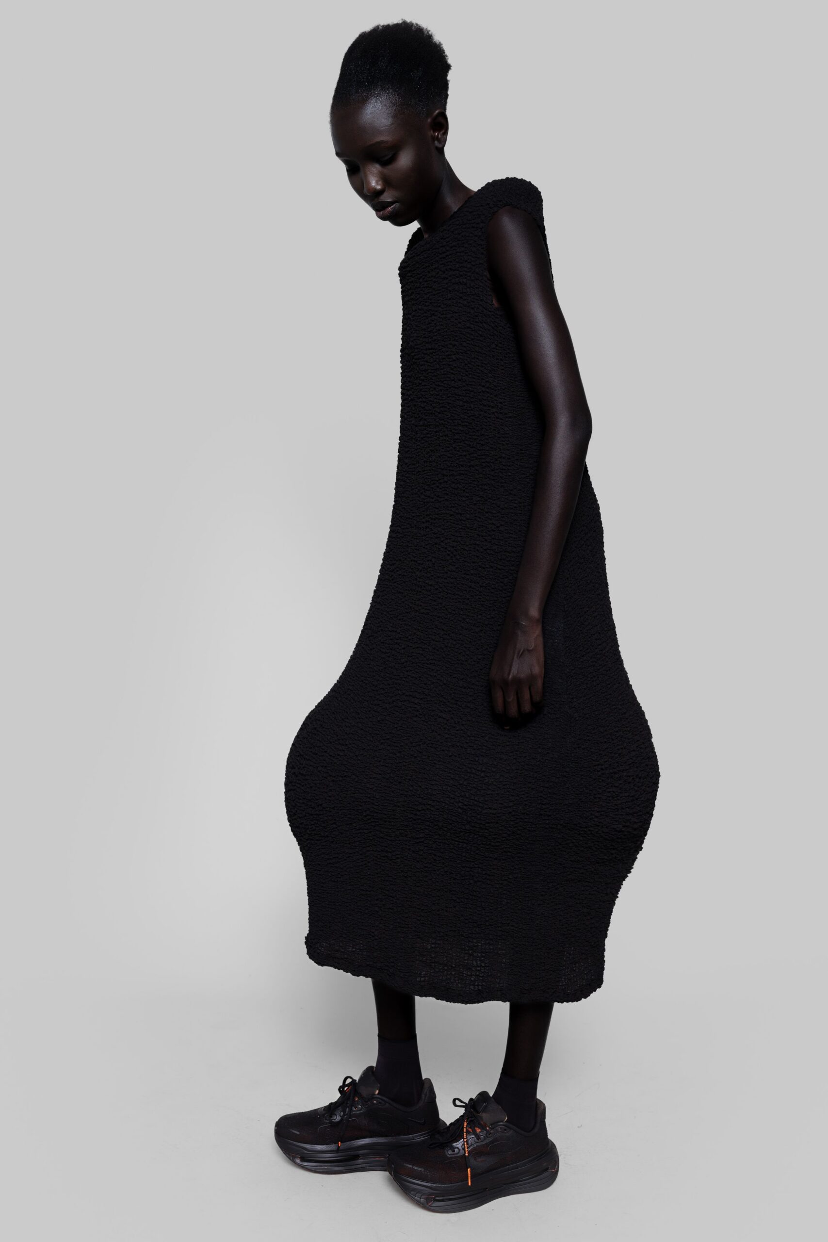 black relaxed midi dress with chunky shoes