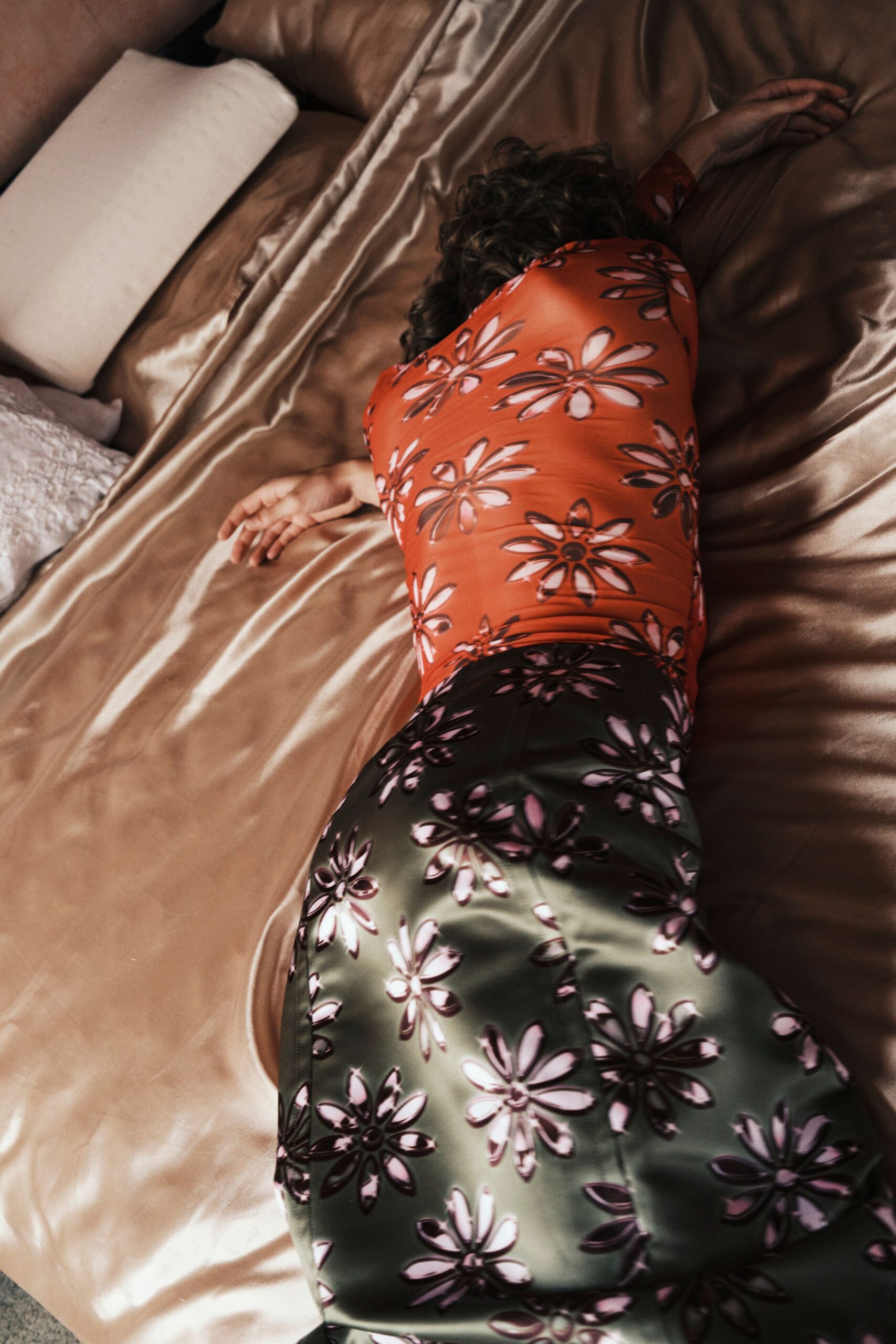 floral orange top and green skirt