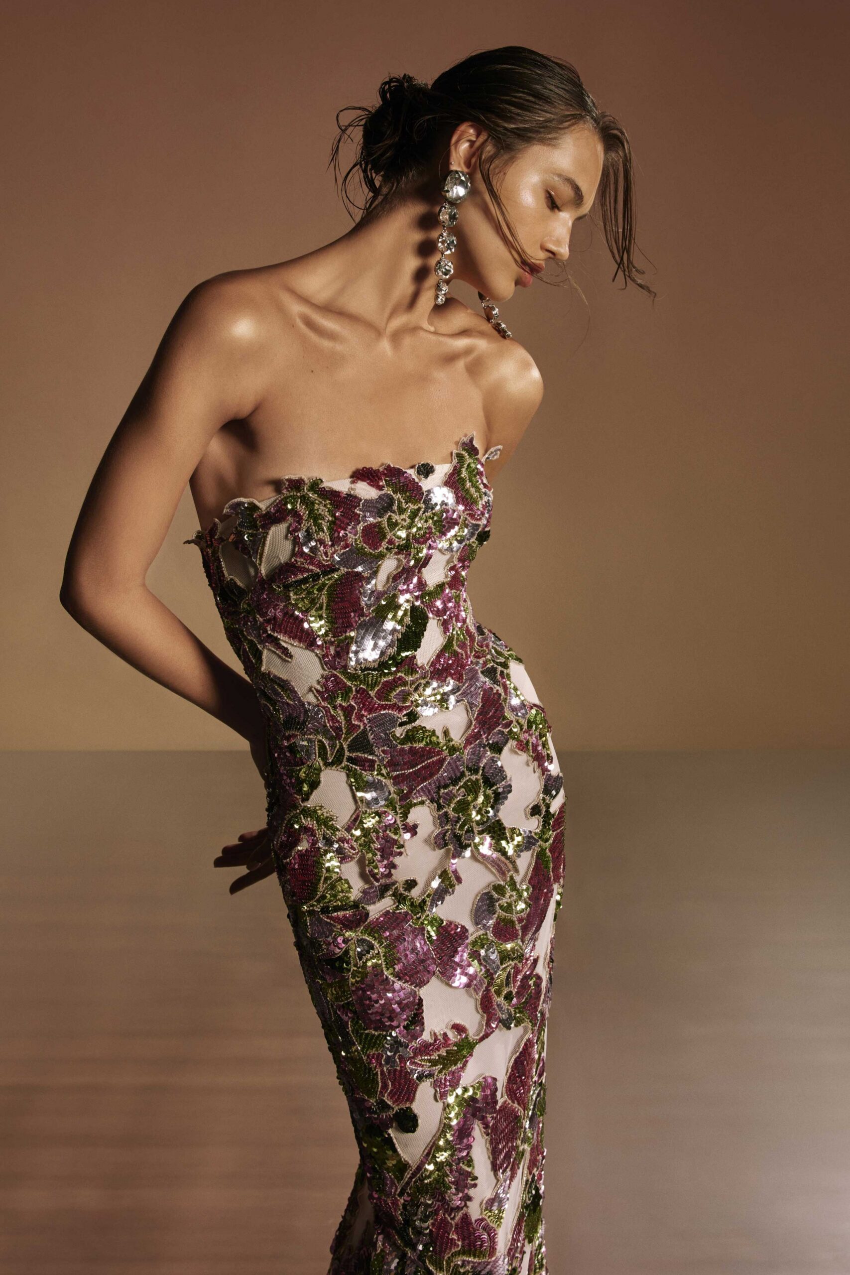 purple green embroidered strapless gown