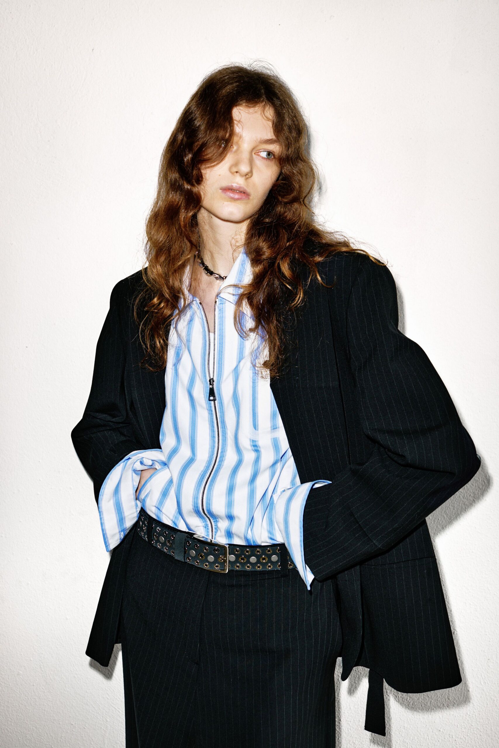 black blazer with striped shirt