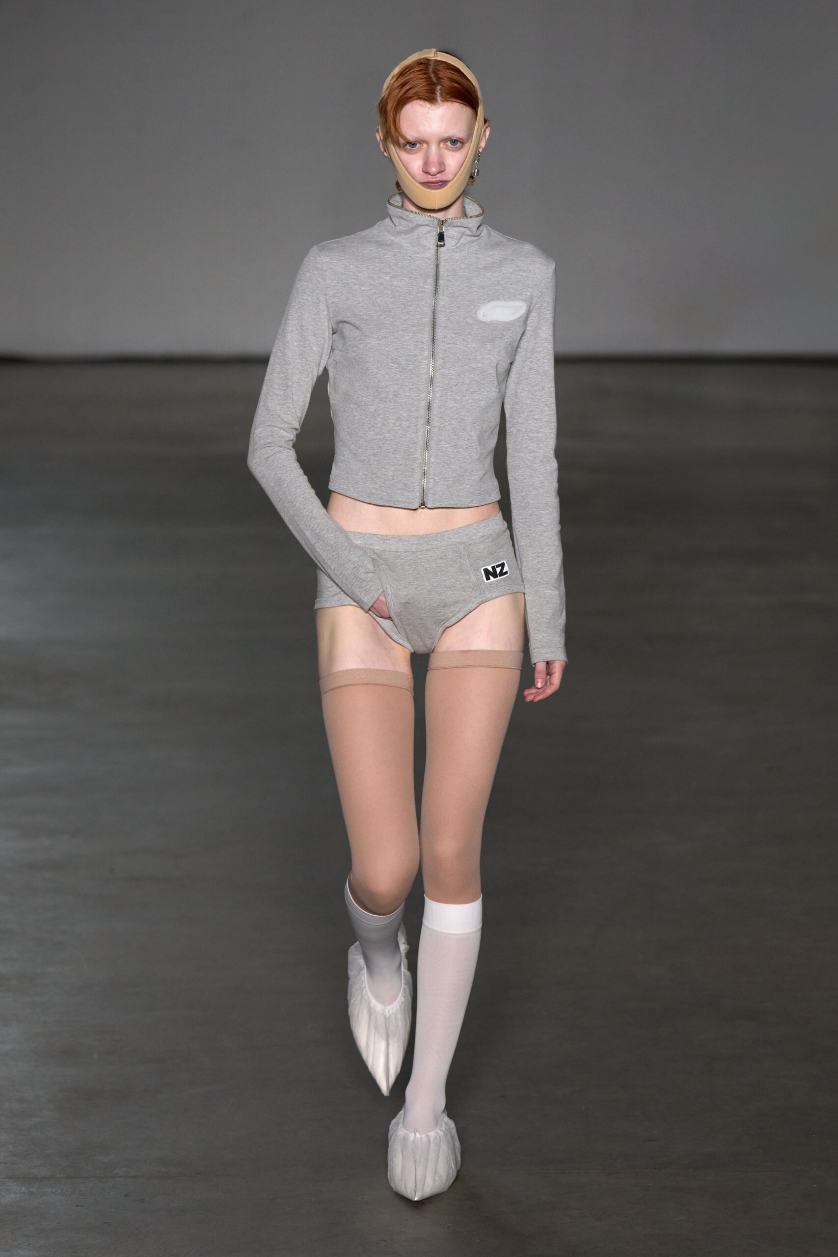 gray fitted top and shorts