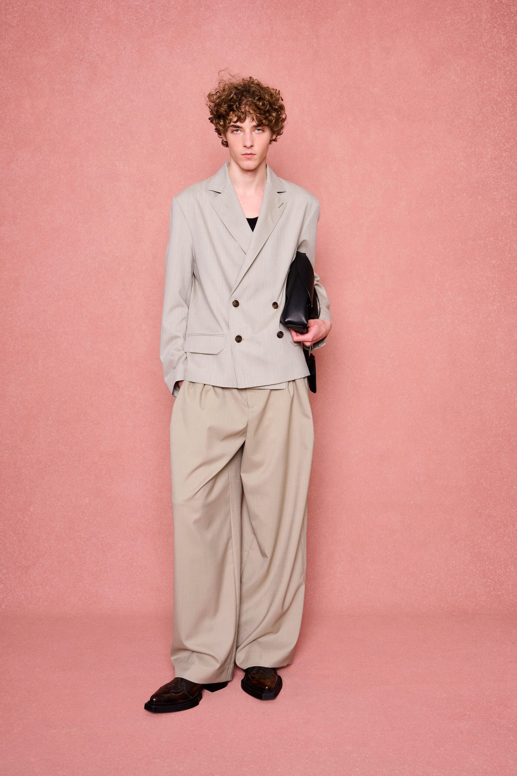 beige striped blazer with relaxed pants